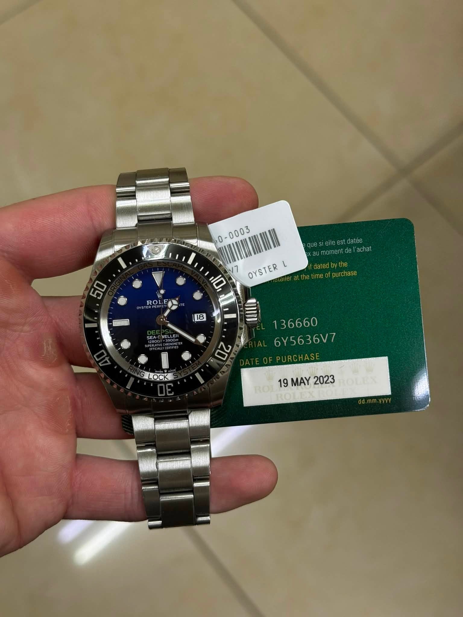 May be an image of wrist watch and text that says ' /7 OYSTER L 10 ROL 18 וו 136660 6Y5636V7 20 LOCK 19 MAY 2023 ROLEX ROT'