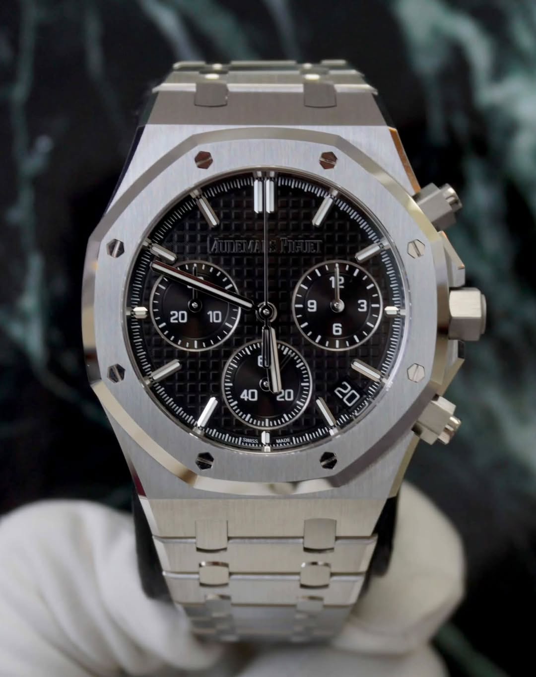 May be an image of wrist watch and text