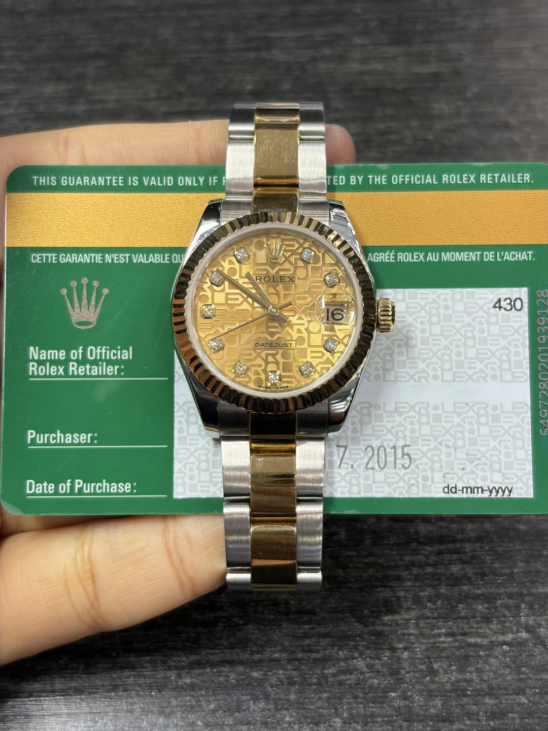 May be an image of wrist watch and text that says 'THIS GUARANTEE IS VALID ONLY IF THISGUARANTEEISVALIDONLYIEP អផ្កស្ៀក៉ TED BY THE OFFICIAL ROLEX EDBYTHE.OFFICIALROLEXRETAILER…