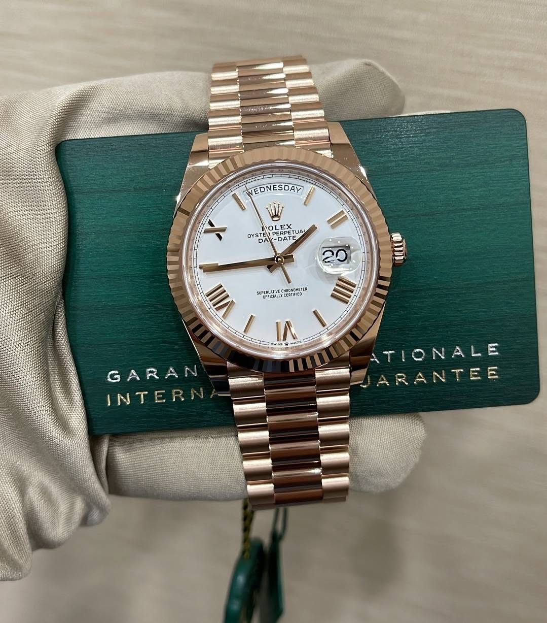 May be an image of wrist watch and text