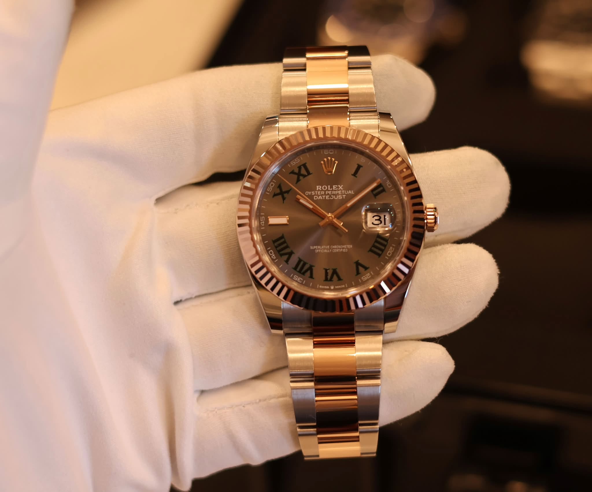 May be an image of wrist watch and text that says 'ROLEX DATEJUST UST TUA JUS H 3'