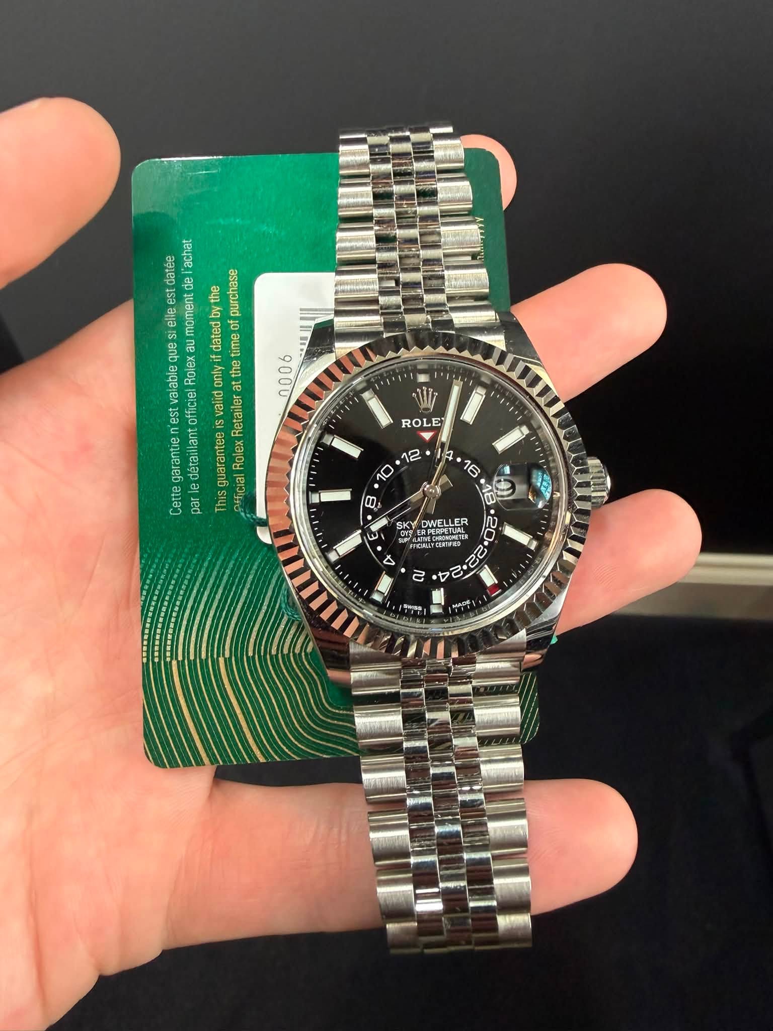 May be an image of wrist watch and text that says 'ep Jeype S Sire ele OTO moment ه gurchase ques xau dated 00 time alabie Rolex m the n'est officie Retailer garantie Rolex…