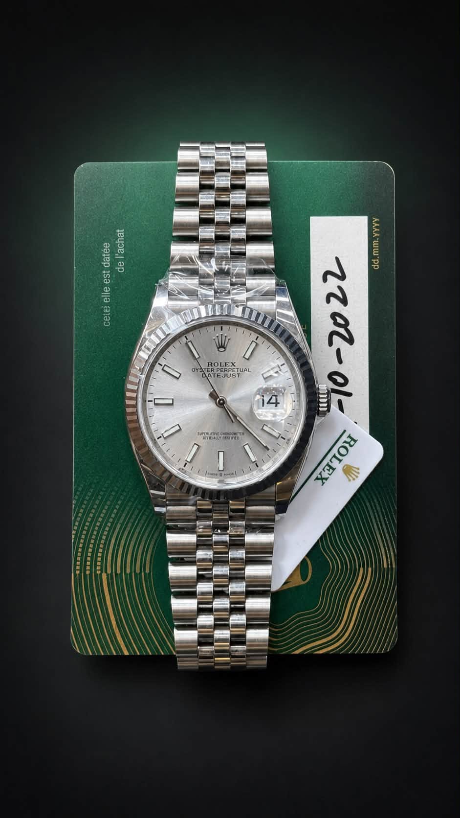 May be an image of wrist watch and text that says 'datée de 'achat est el elle cete W ATER NATE PERPET ROLEX AL L ATEJU TEJUST D' mm.YYYY YYYY 14 即 てて - dd ROLEX 小 U'