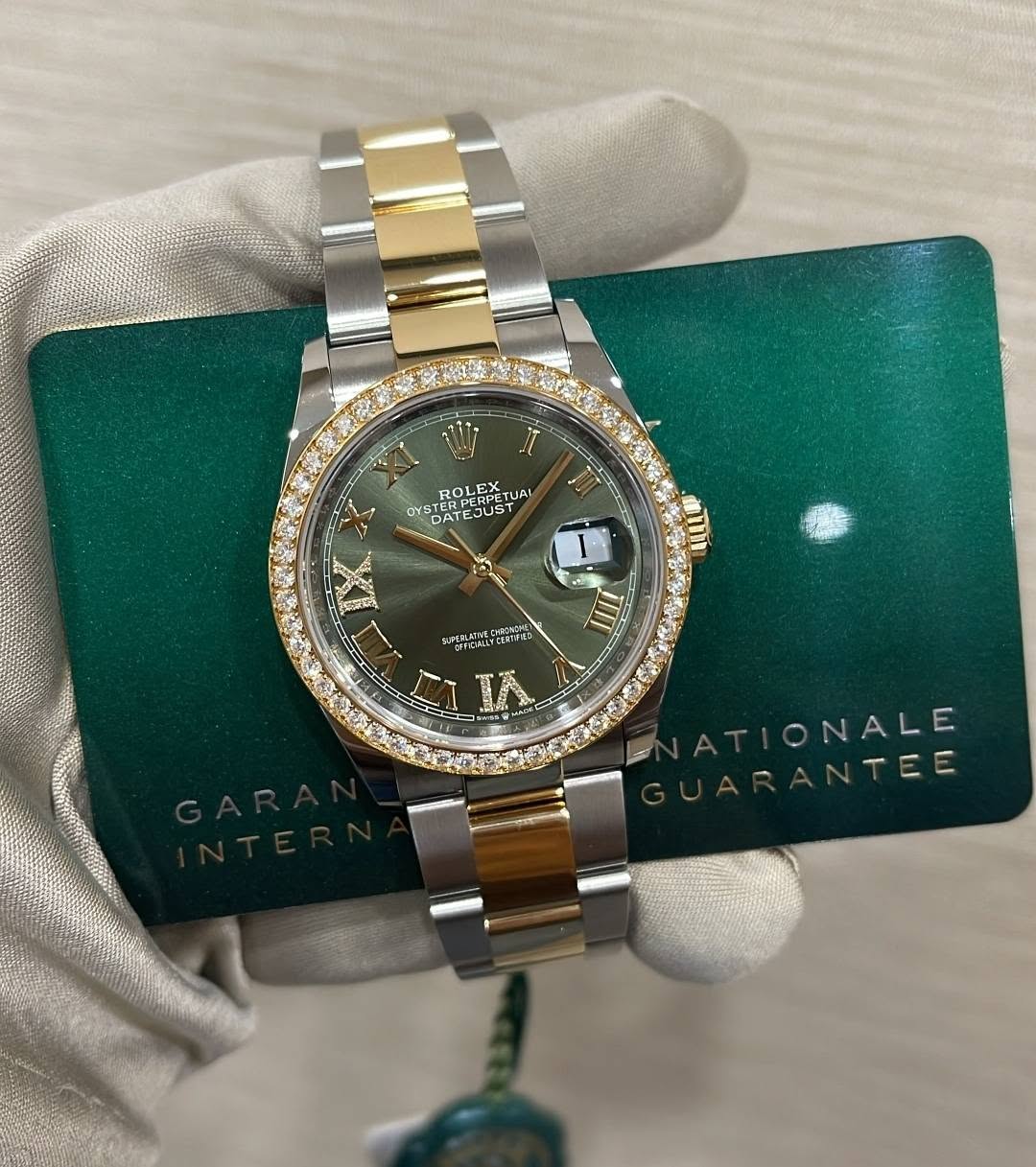 May be an image of wrist watch and text