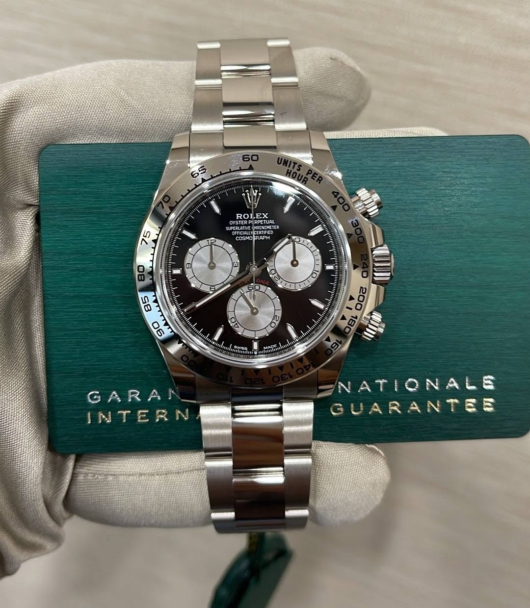 May be an image of wrist watch and text