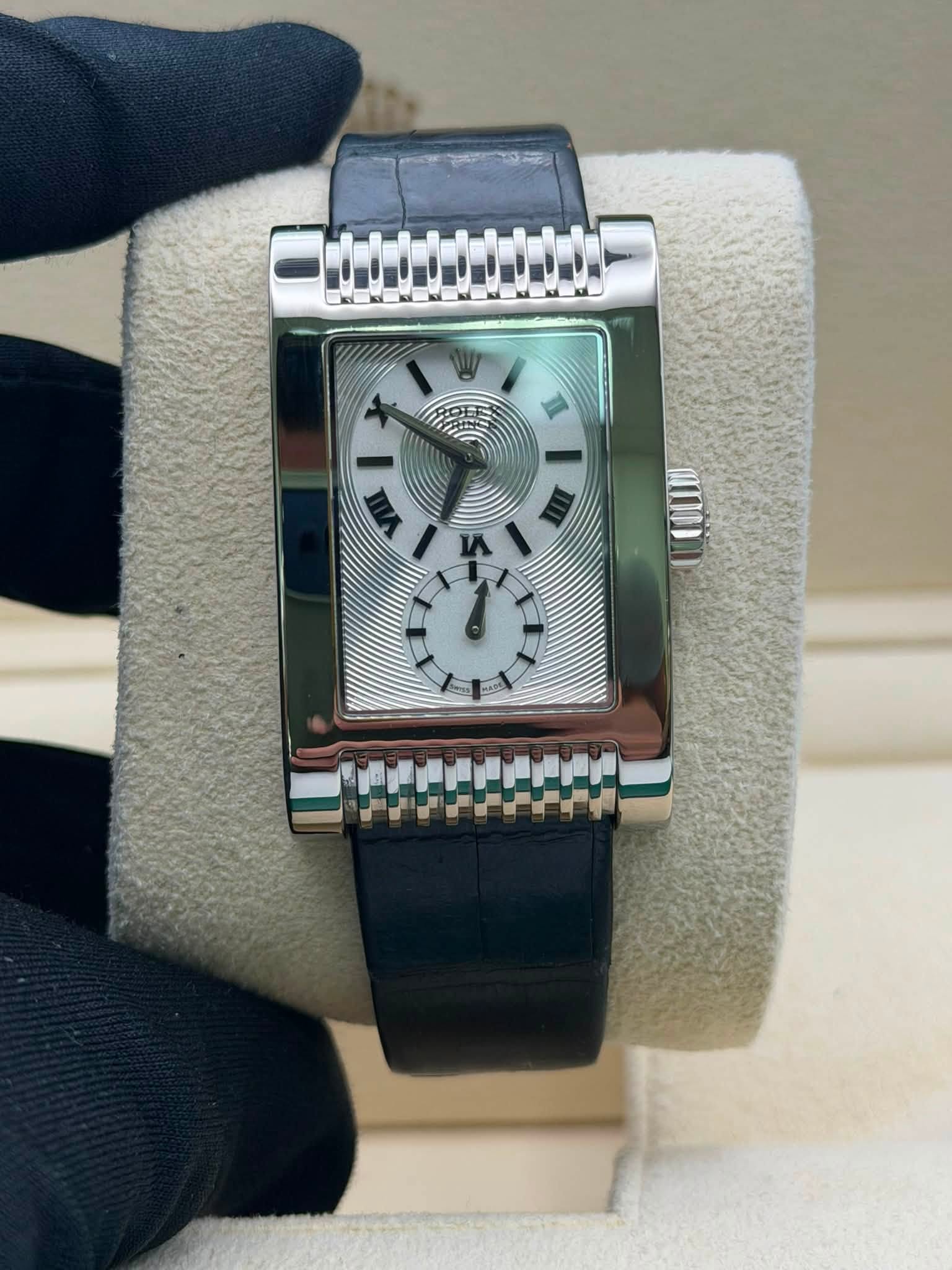 May be an image of wrist watch and text