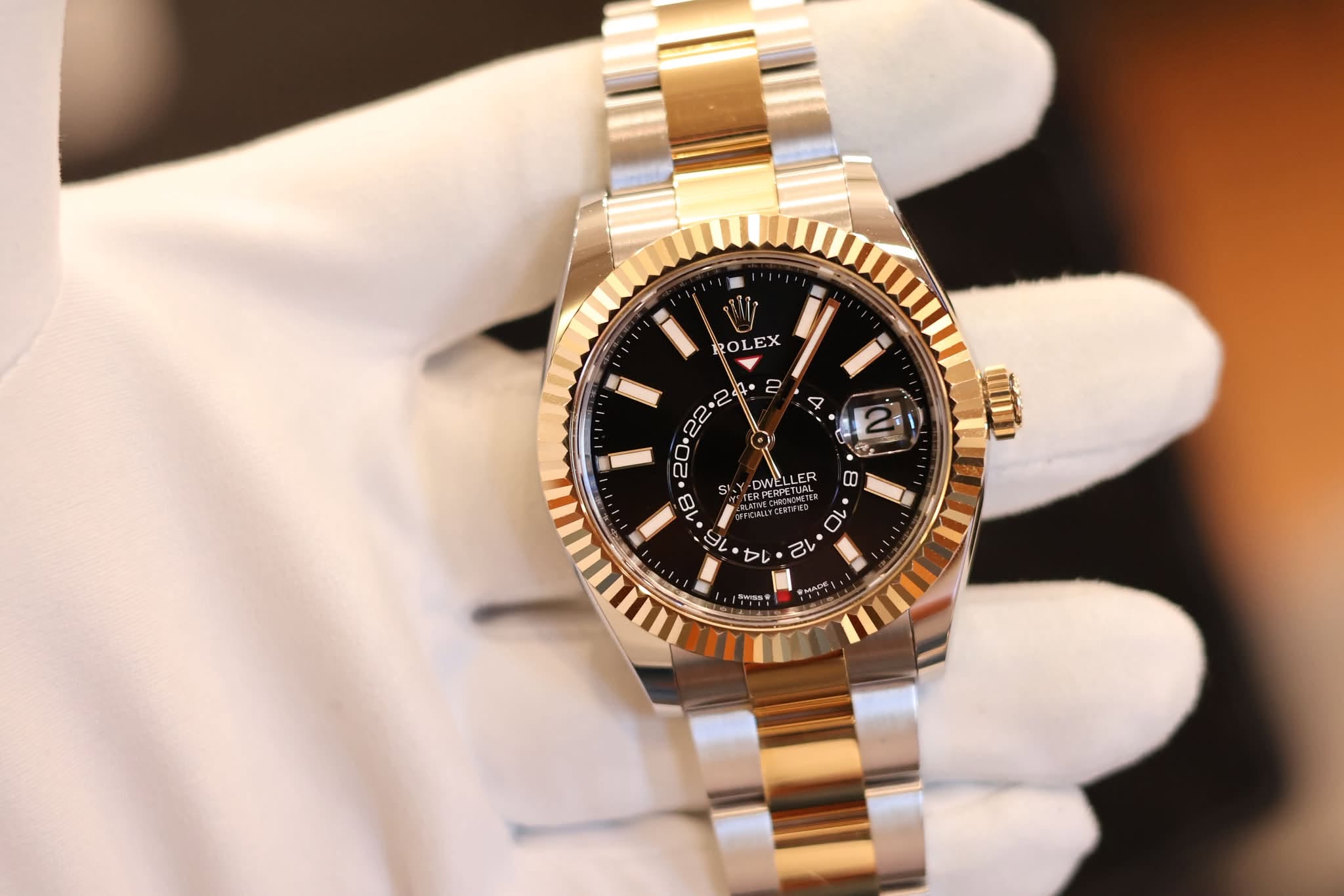 May be an image of wrist watch and text