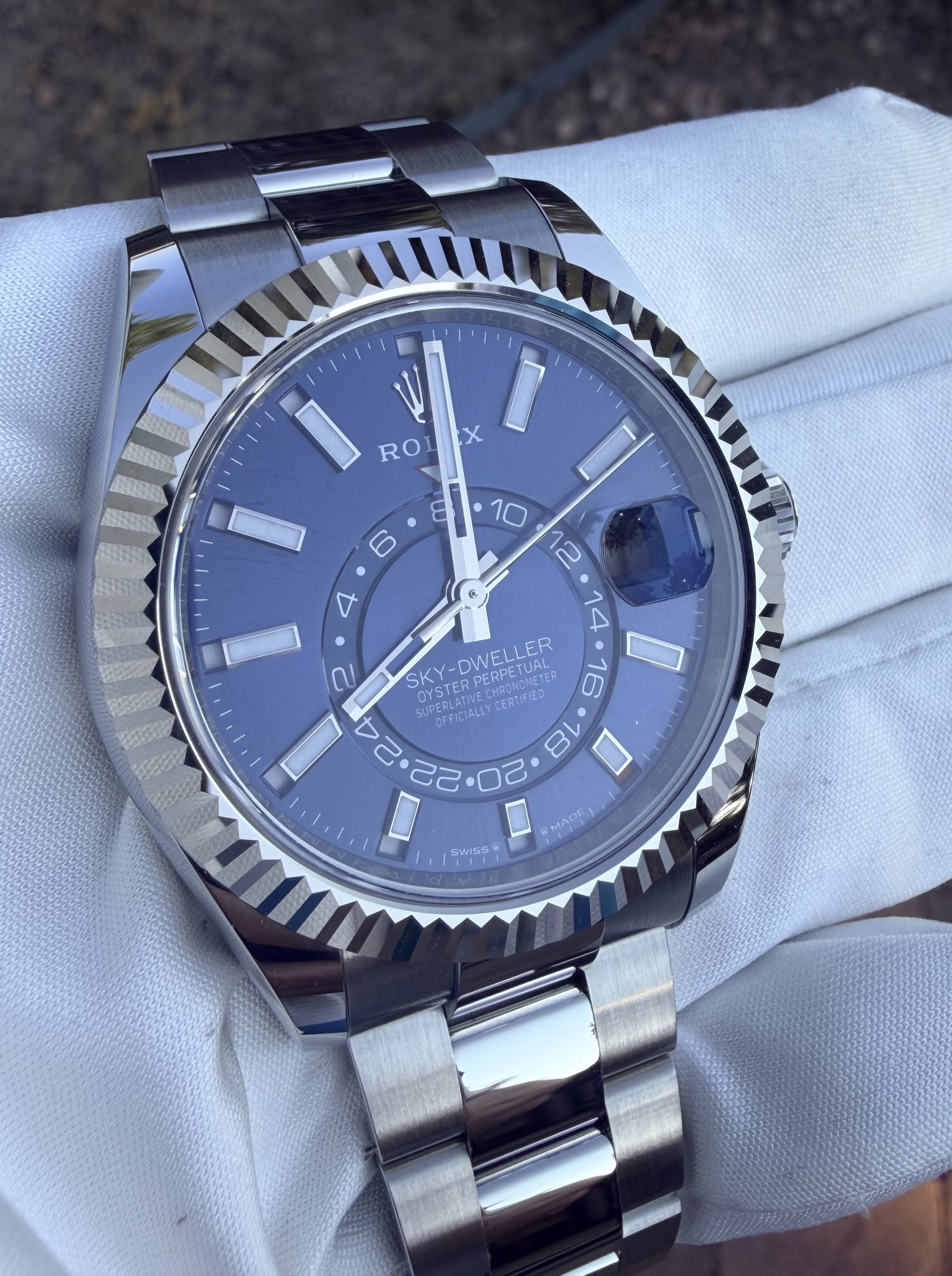 May be an image of wrist watch and text