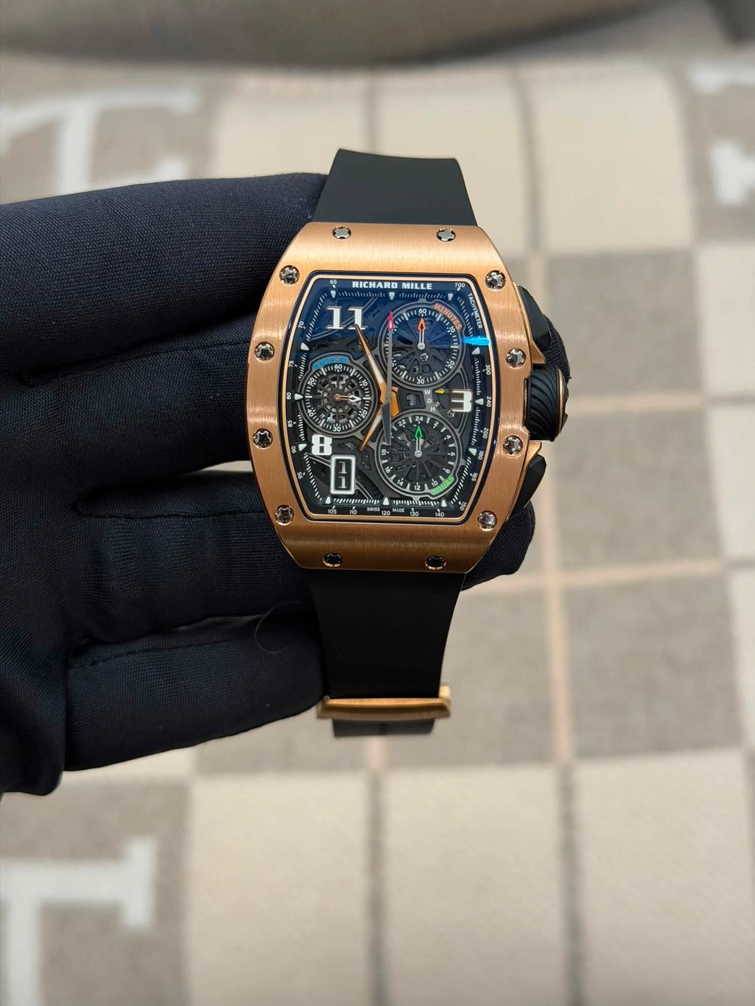 May be an image of wrist watch and text