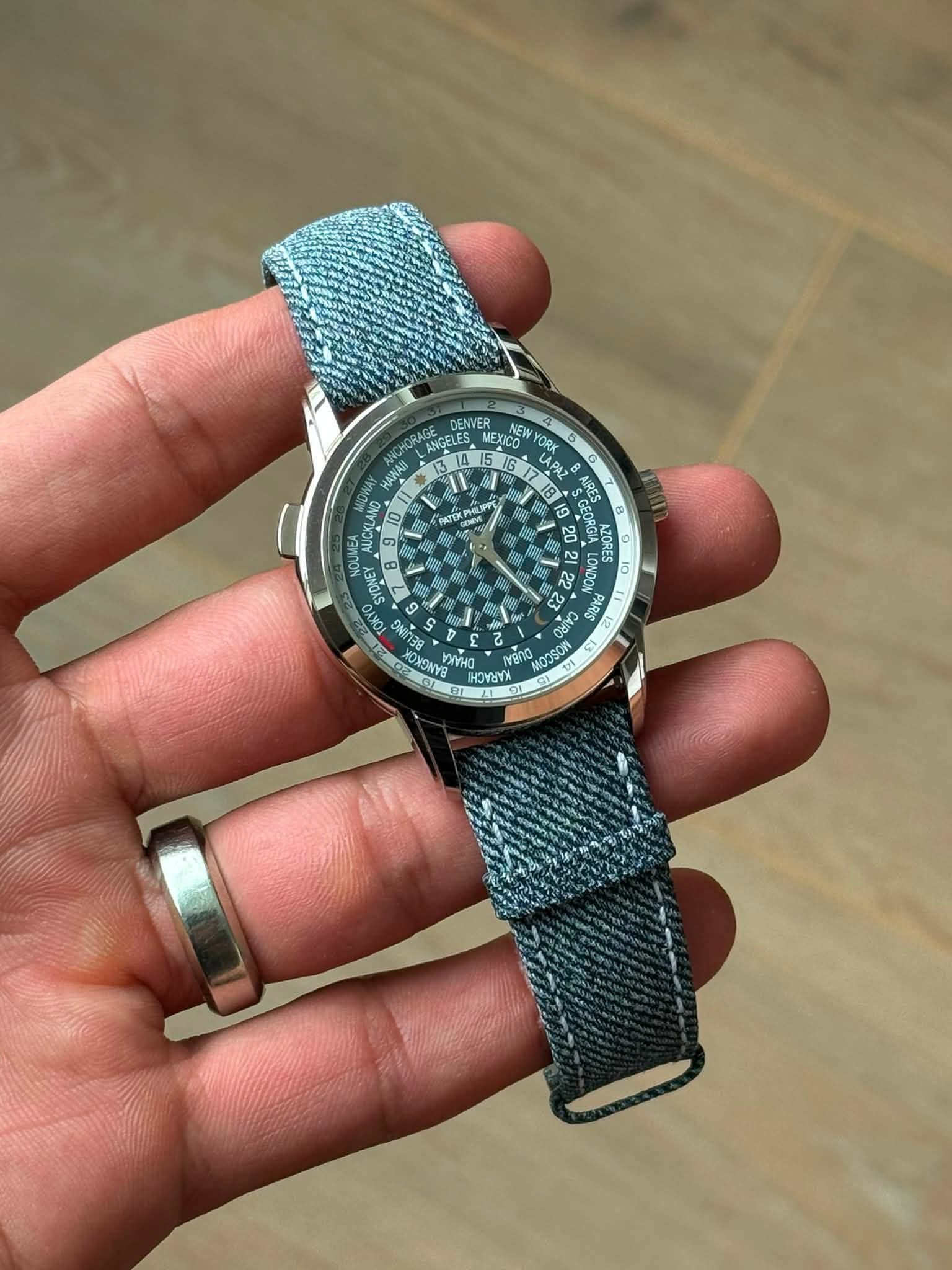 May be an image of wrist watch and text