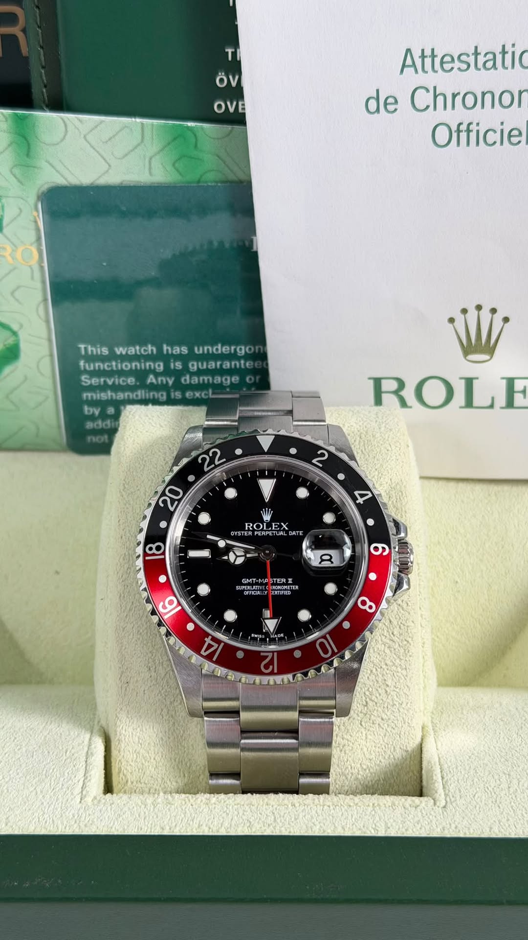 May be an image of wrist watch and text that says 'τι Öv OVE Attestatic de Chronon Officiel This Thiswatchasundergo watch has undergo functioning functioningisguarante is guarante…