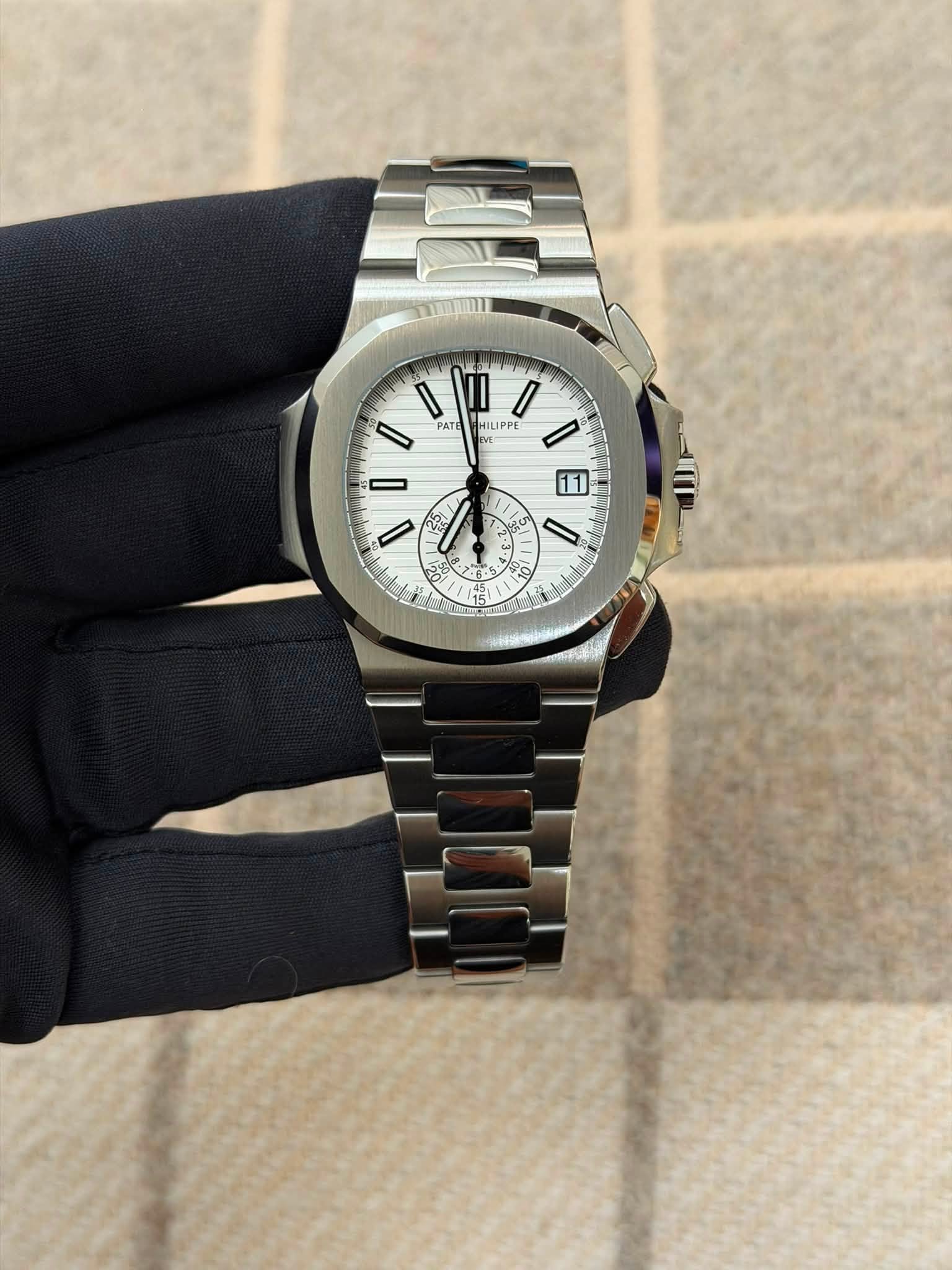 May be an image of wrist watch and text that says 'התובר I II / I PATE HILI HILIPPE PE JPPI I ប្ិង 21 11 D 51 I 40 ل 20 +ር'