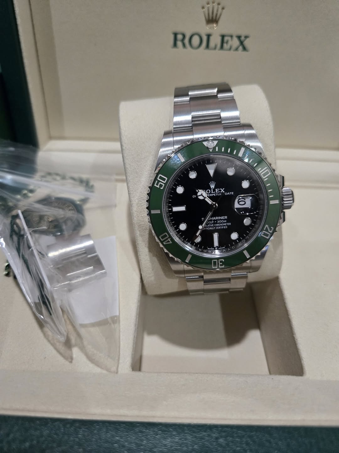 May be an image of wrist watch and text
