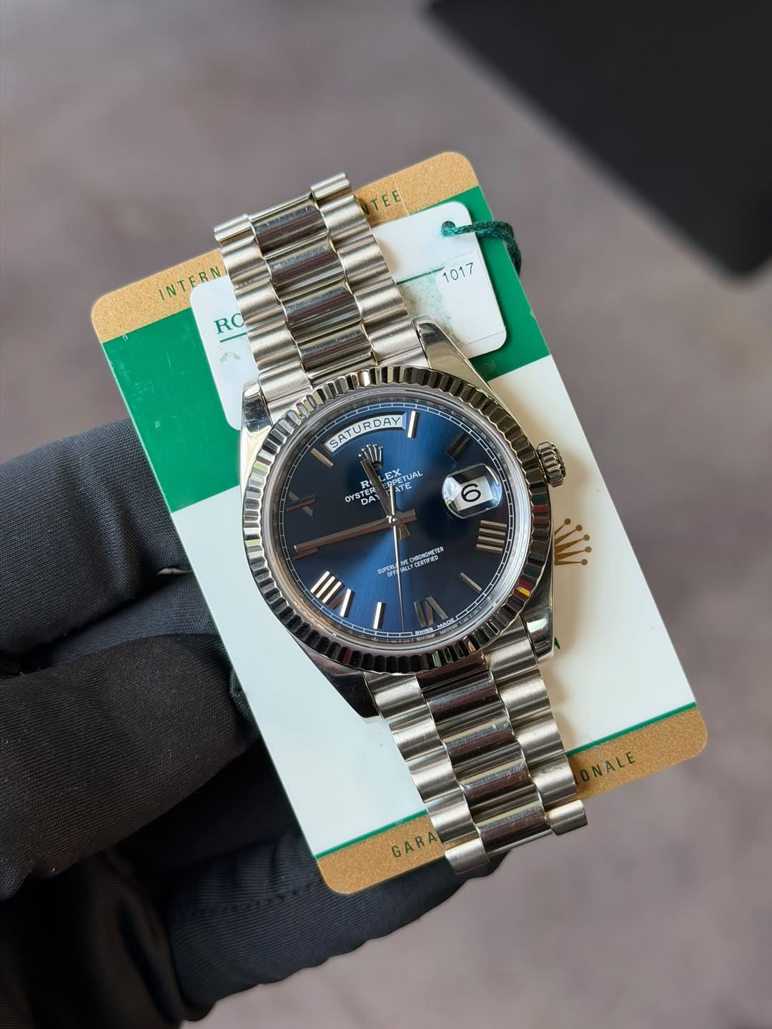 May be an image of wrist watch and text