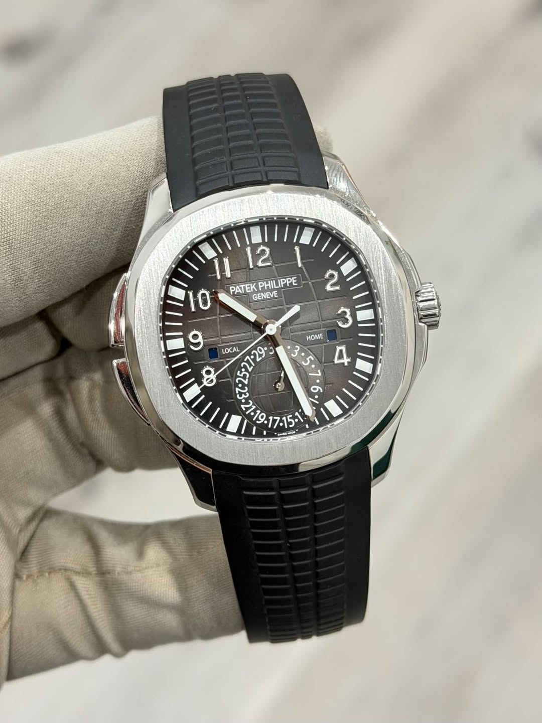 May be an image of wrist watch and text