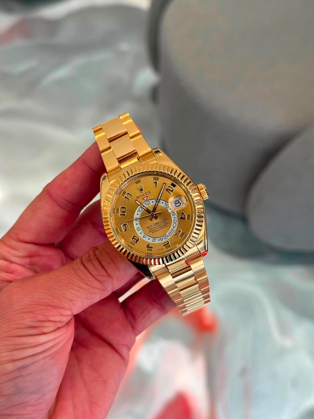 May be an image of wrist watch and text