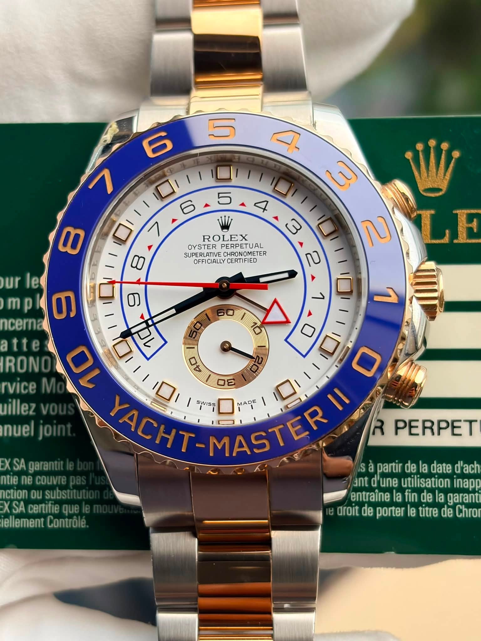 May be an image of wrist watch and text that says ' ROLEX OYSTER PERPETUAL PETUAL SUP DFFICAUYCERTIFIED CERTIFIED SUPERLATIVE HRONOMETE 4 3 3 2 LE 2 < יםי 1 D ur le တ ncerna…
