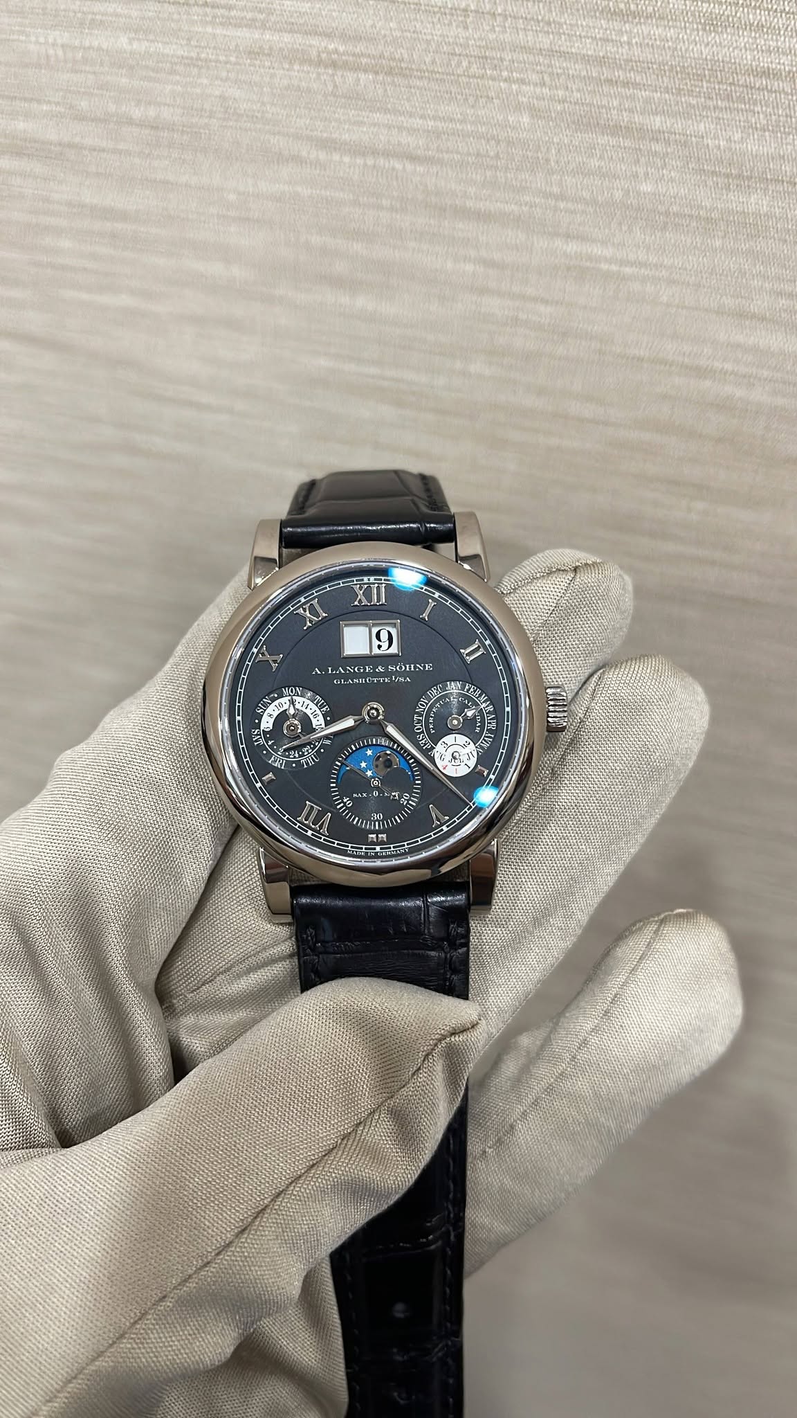 May be an image of digital watch and text
