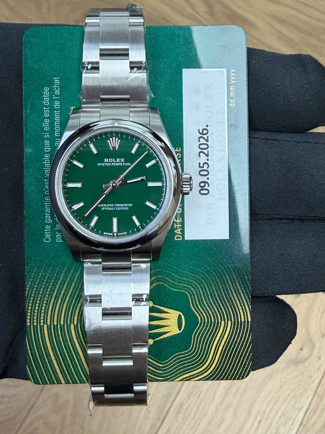 May be an image of wrist watch and text that says 'datee de 'achat est moment no elle que valable garantien'es ب Lest garantie Cette Le par ROLEX OYSTER STERPERPET PERPETU TUM K…