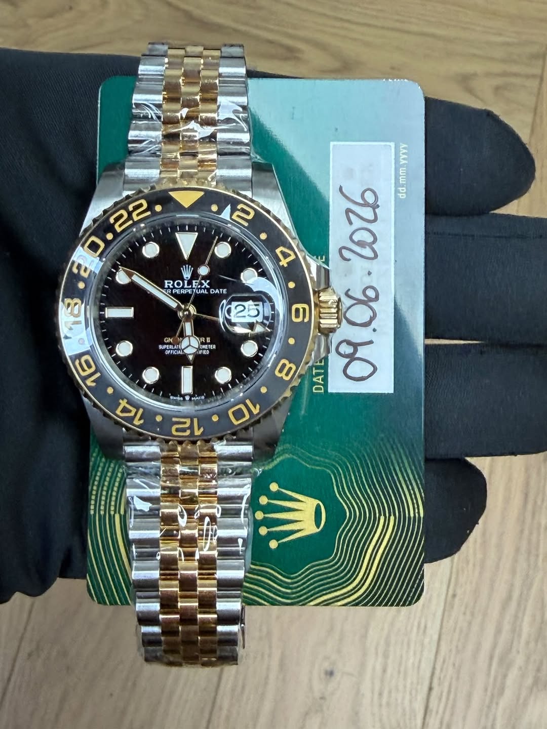 May be an image of wrist watch and text