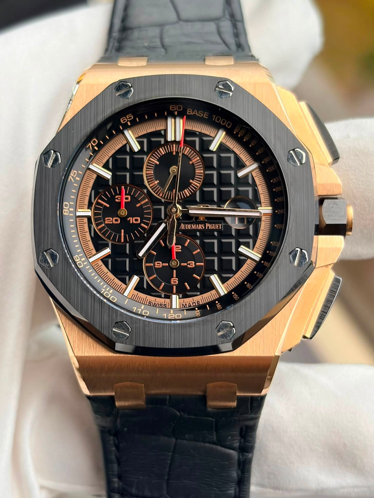 May be an image of wrist watch and text