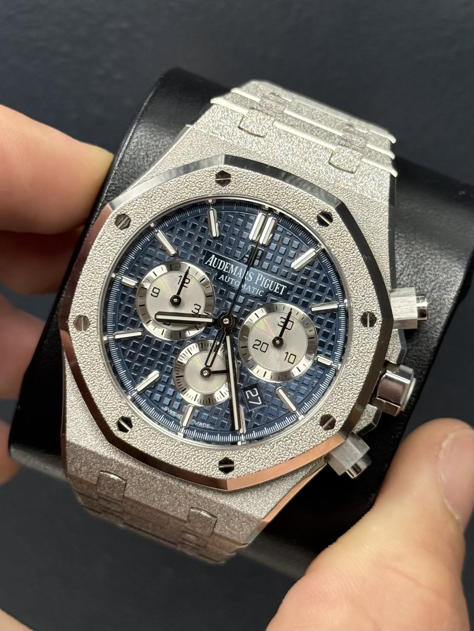 May be an image of wrist watch and text