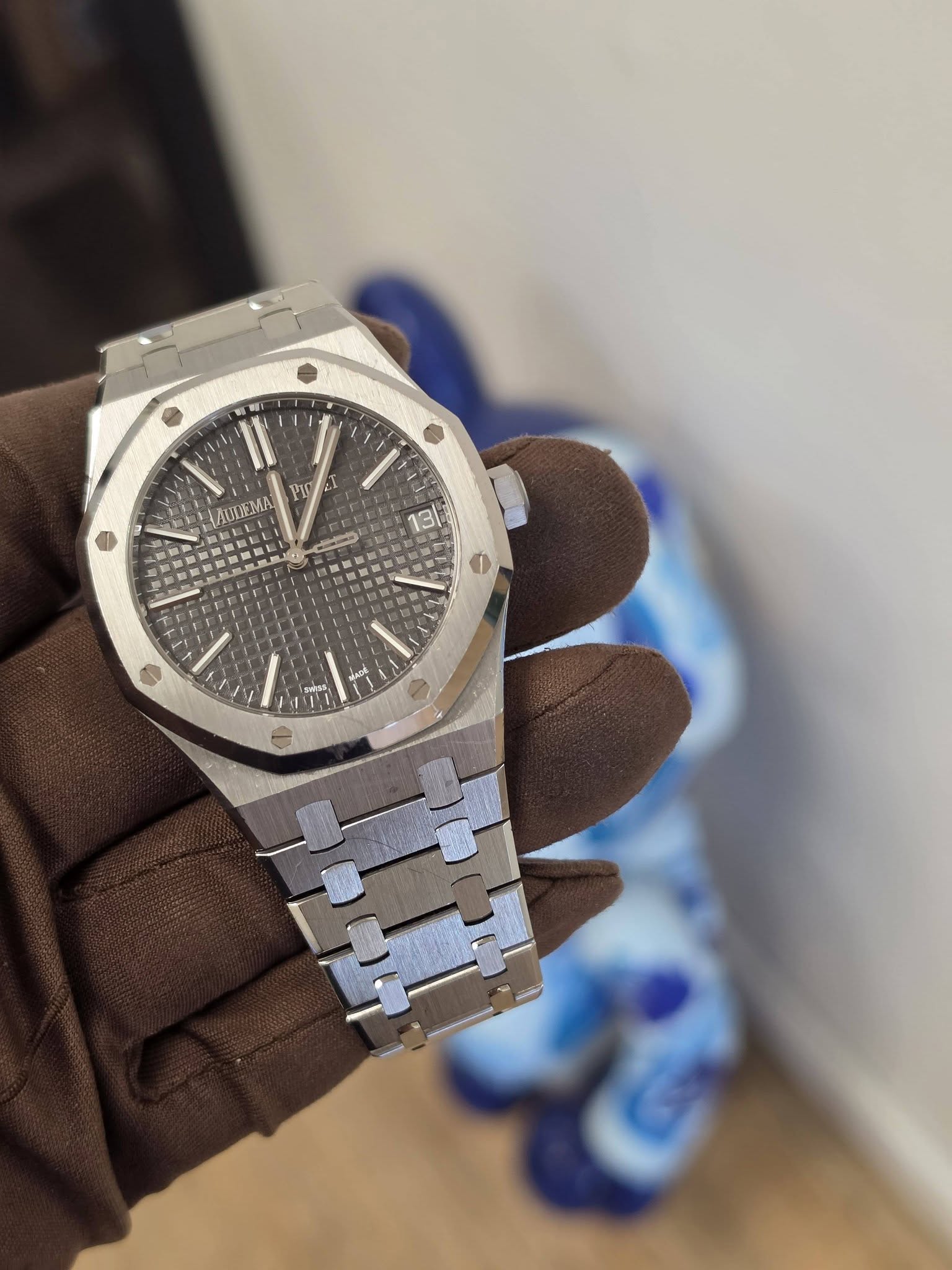 May be an image of wrist watch and text