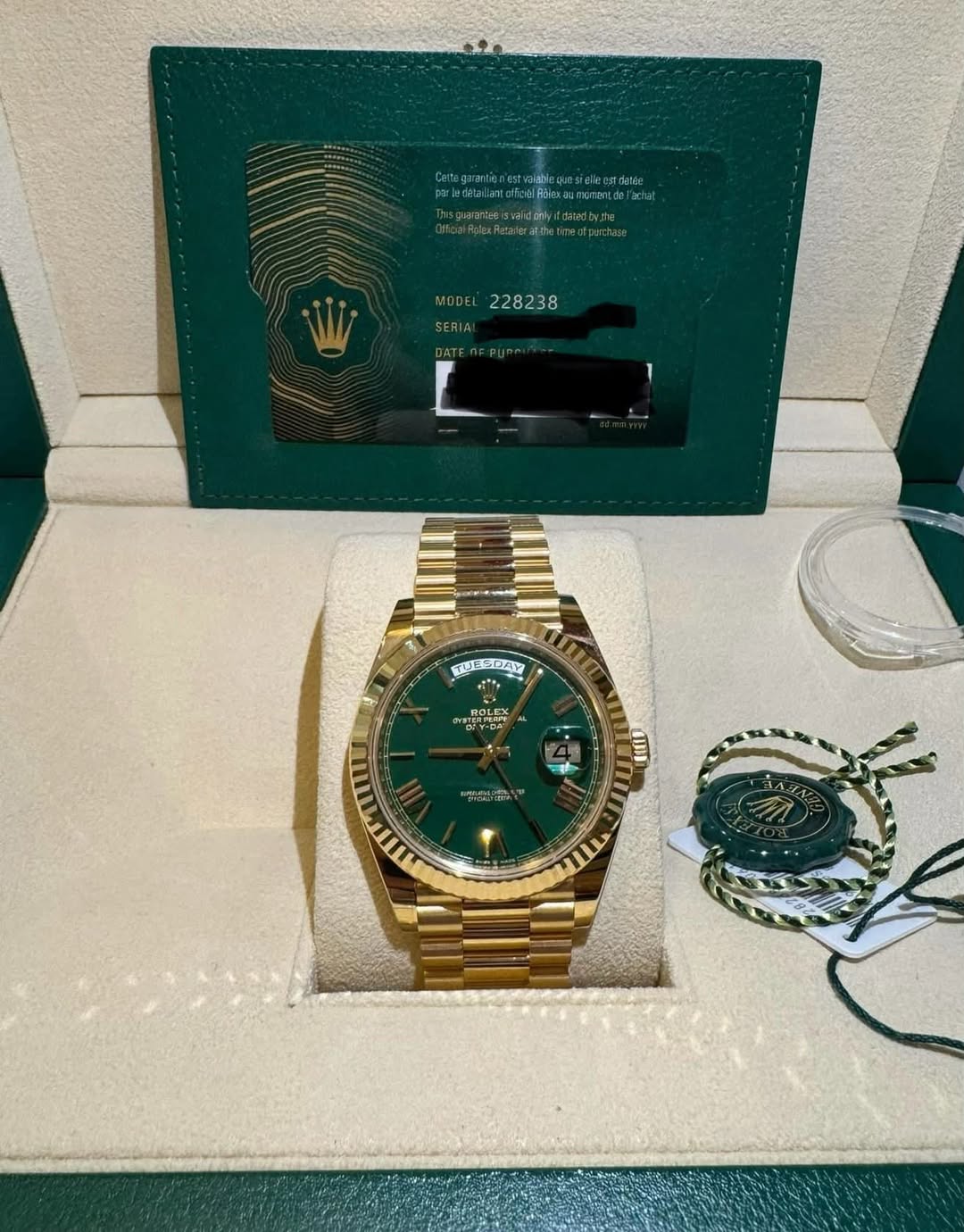 May be an image of wrist watch and text