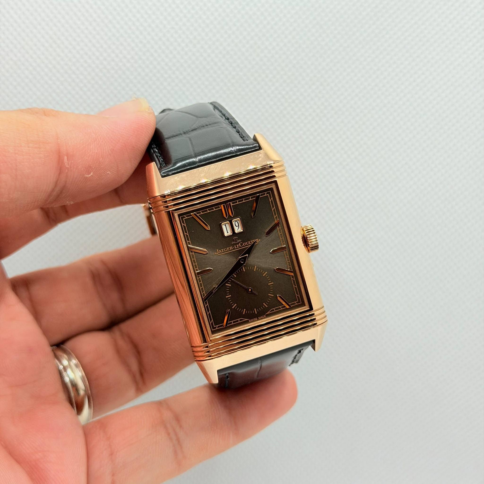 May be an image of digital watch and text