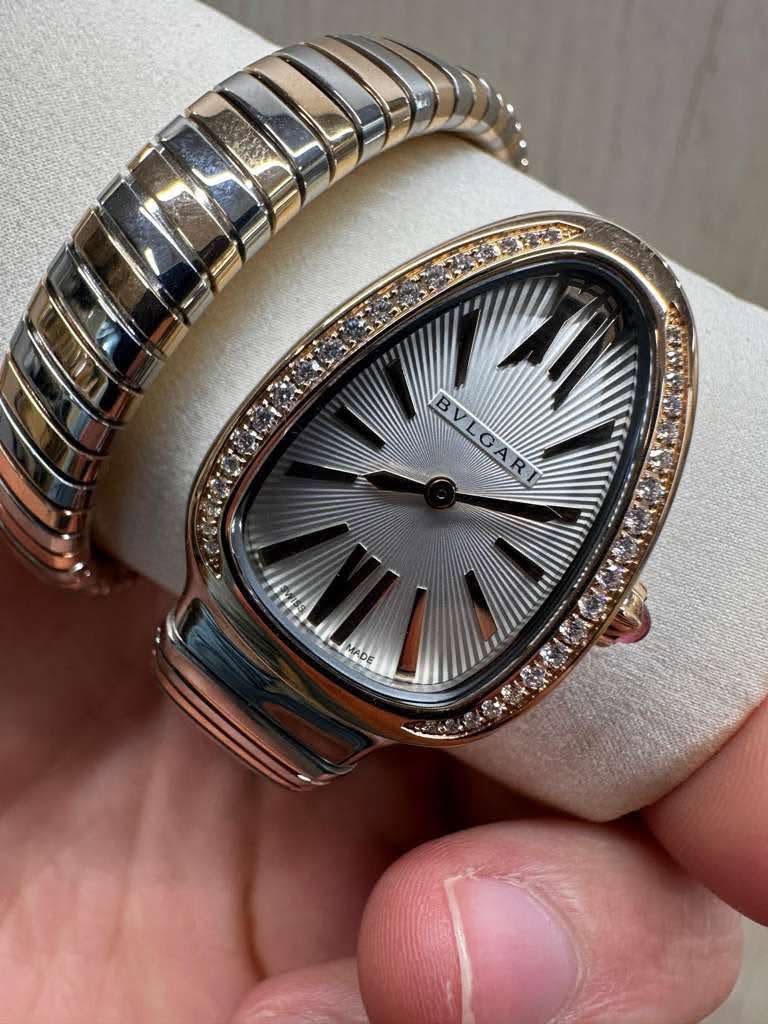 May be an image of wrist watch and text that says 'S U BVLGAR'