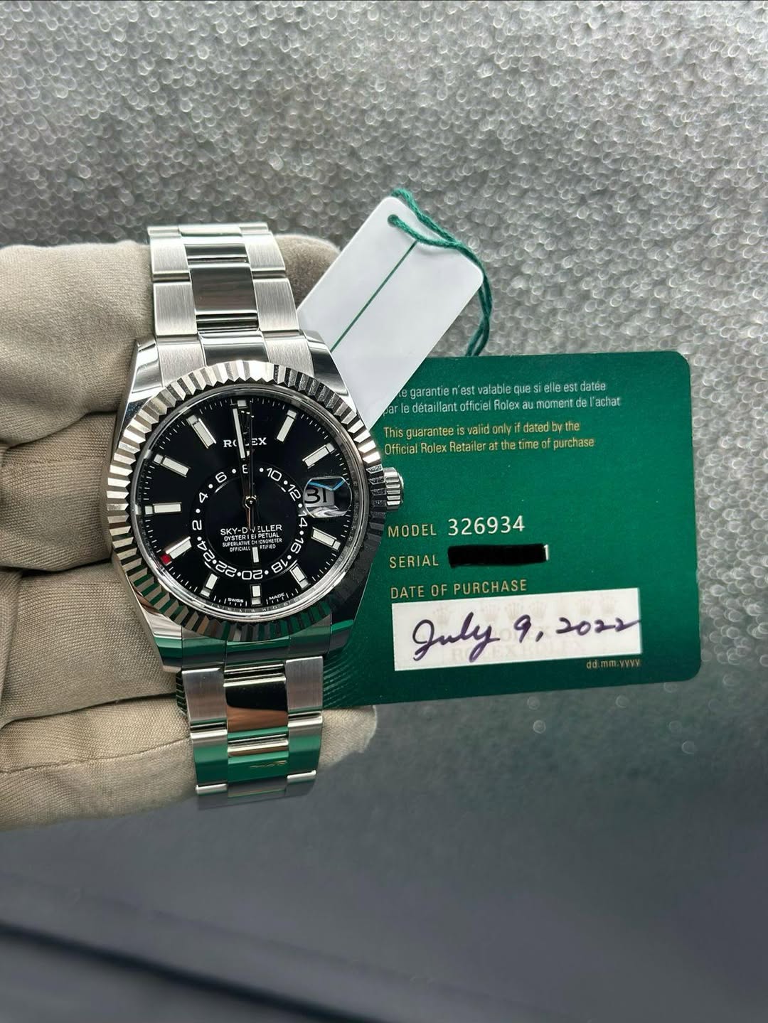 May be an image of wrist watch and text