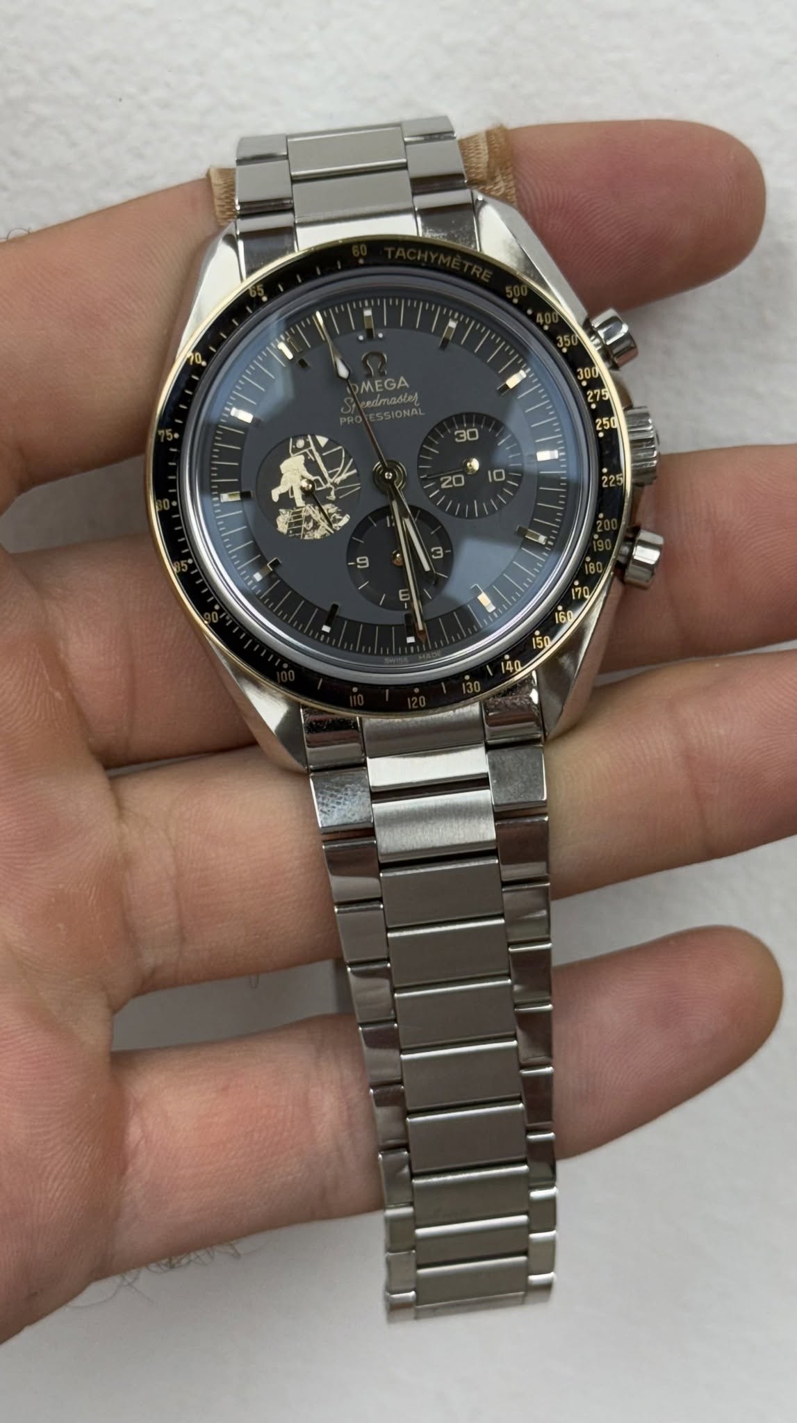 May be an image of wrist watch and text