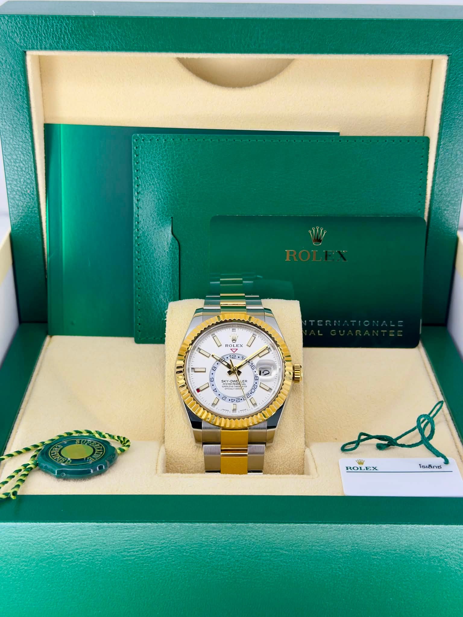 May be an image of wrist watch and text