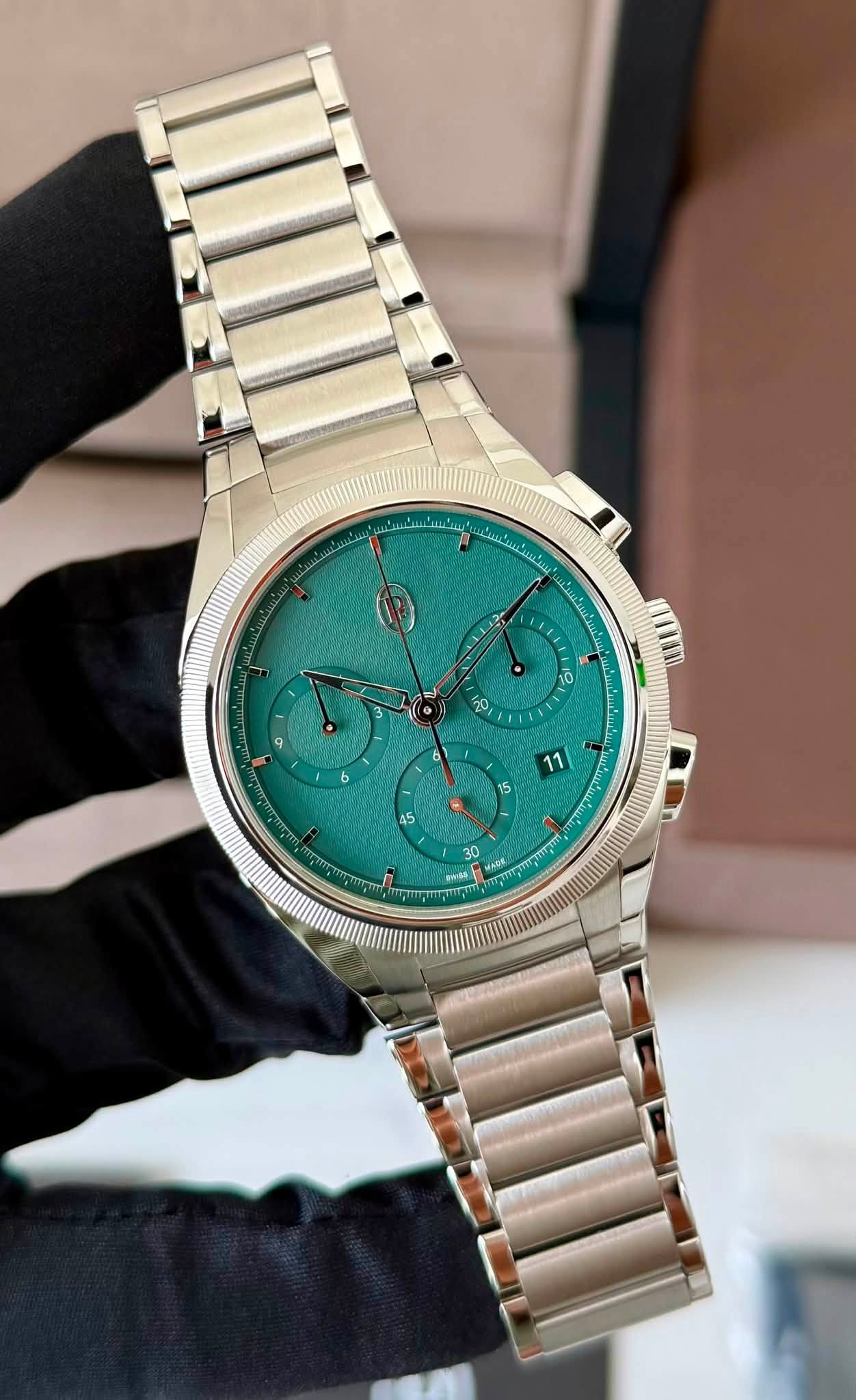 May be an image of wrist watch and text