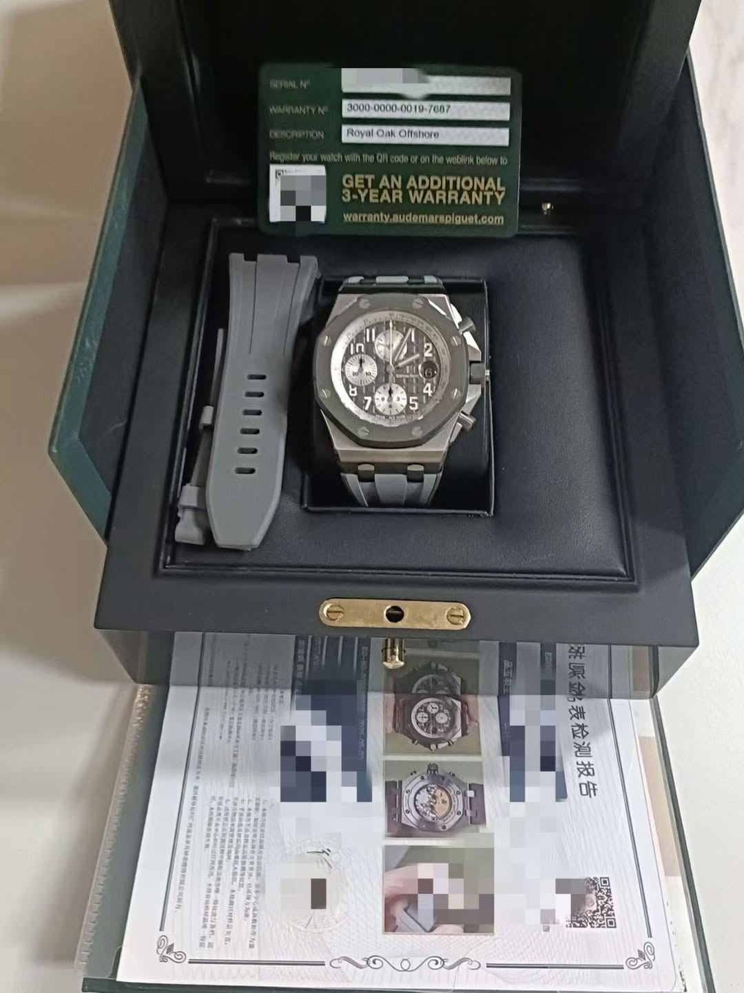 May be an image of digital watch and text that says ' RoyaiO Offshore GETAN GETANADDITIONAL AN ADDITIONAL 3-YEARWARRANTY 3-YEAR WARRANTY warcrenty.mudemareplquet.com חן b תתתזי…