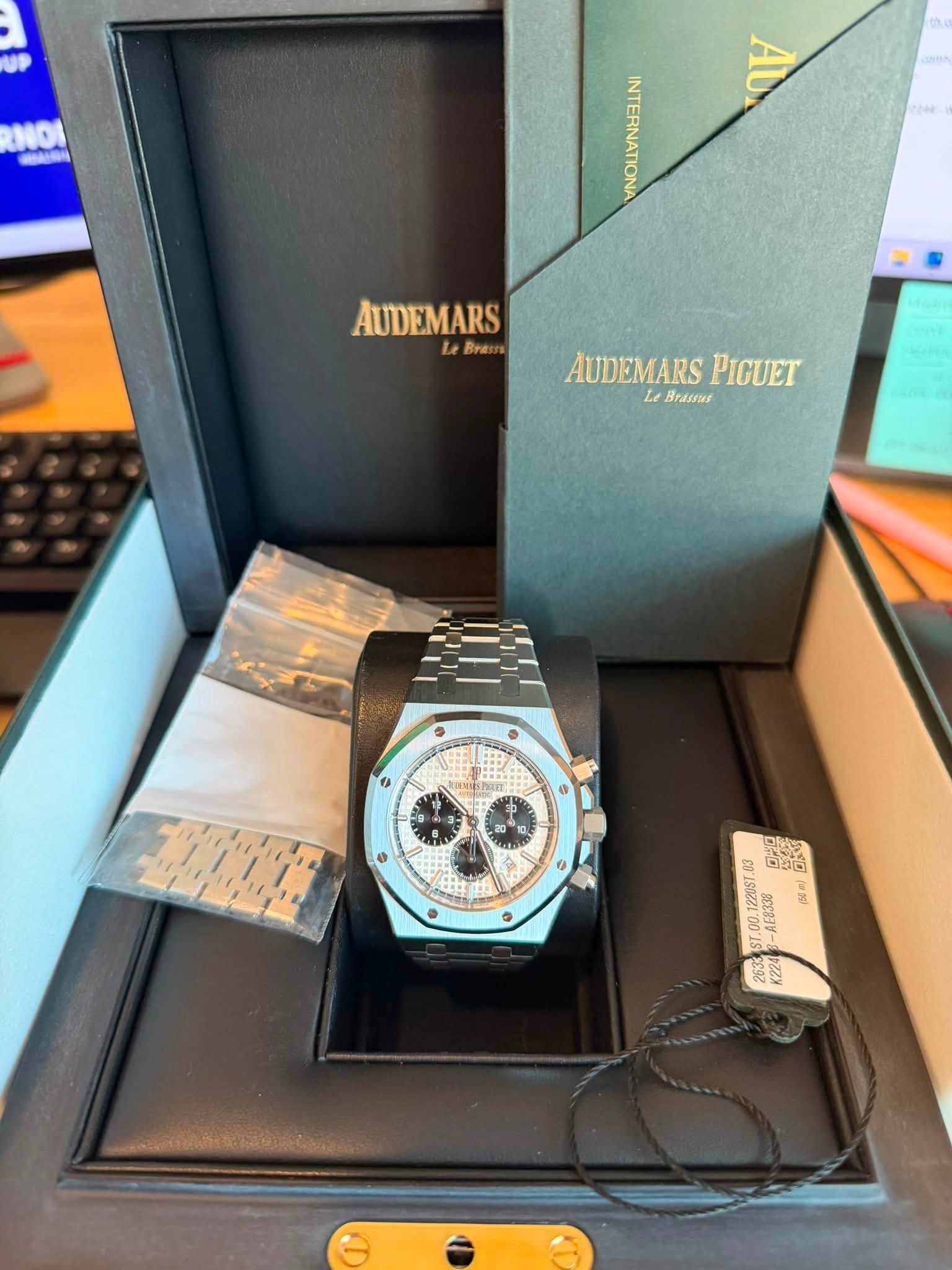 May be an image of wrist watch and text