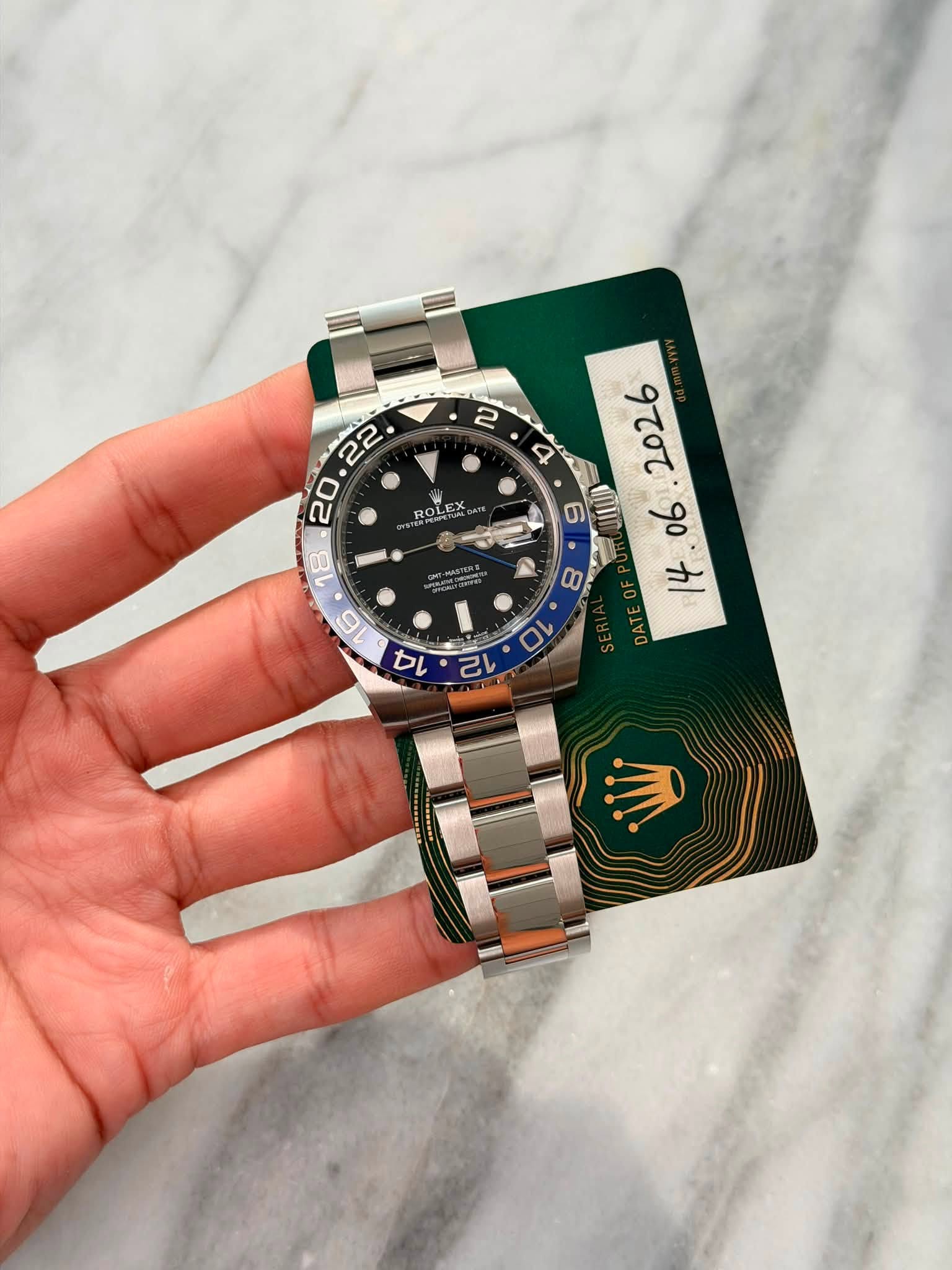 May be an image of wrist watch and text that says '2 4 ROLEX mII 9o か '