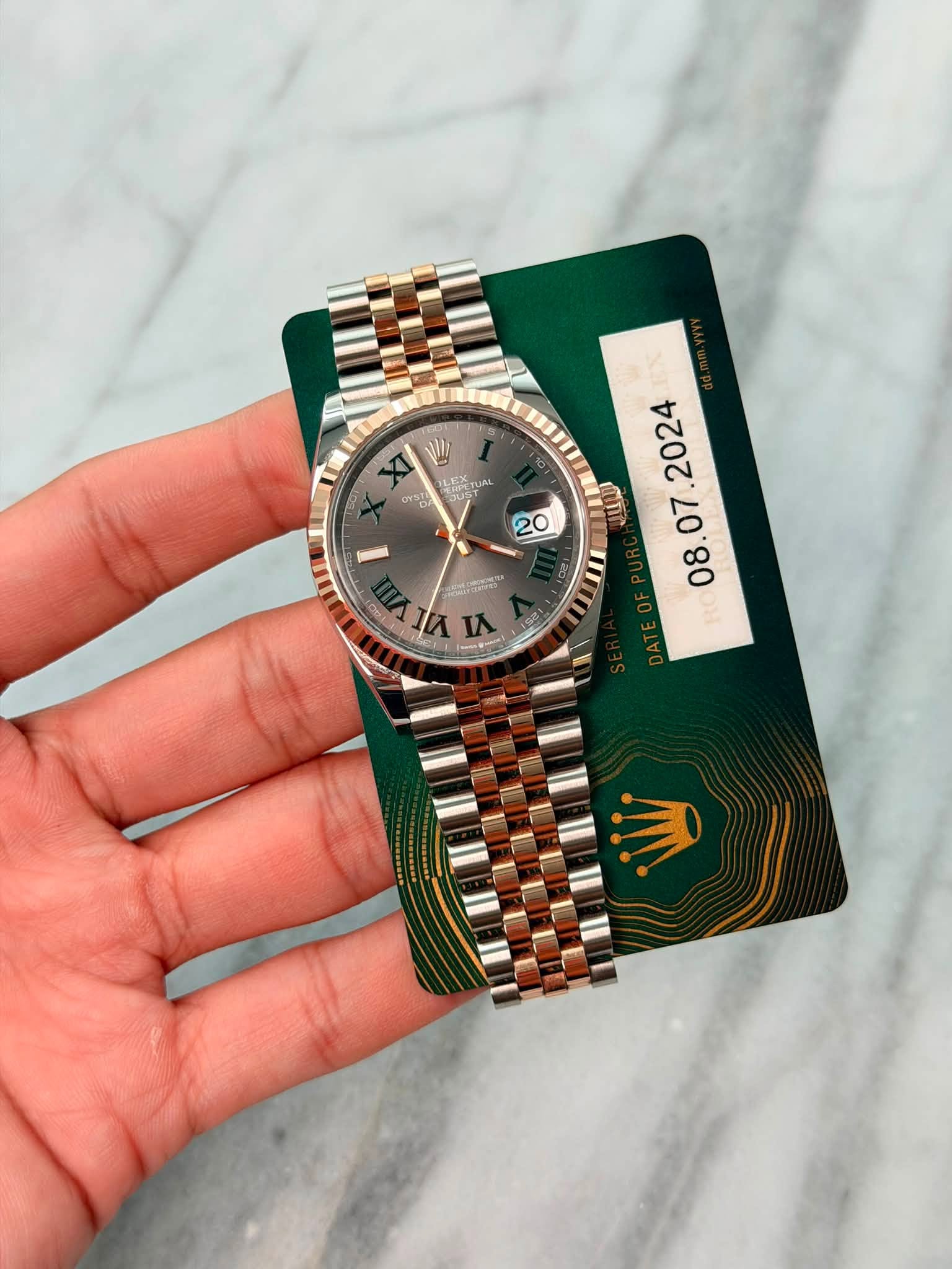 May be an image of wrist watch and text that says 'XT ตะ LEXTA TUAL CA 20 2024 παω . m MiTeNe m 1 V ٤ ላ1 162'