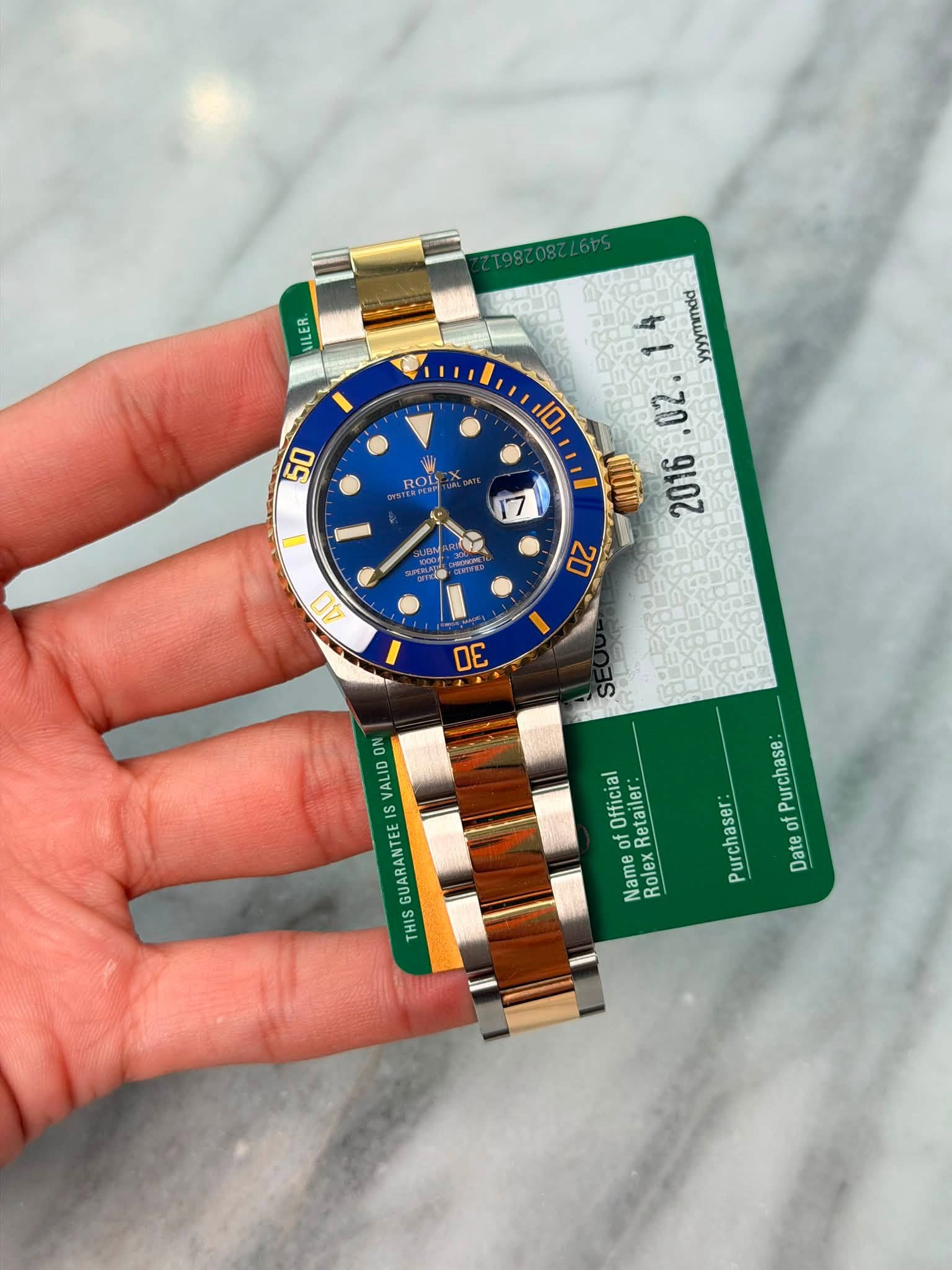 May be an image of wrist watch and text that says 'MヨTル ND yyyymmdd .02. O 2016 7 A0 20 I O የገህ وي Official Name Retailer exnetaner Rolex of Purchase Purchaser of Date THIS'