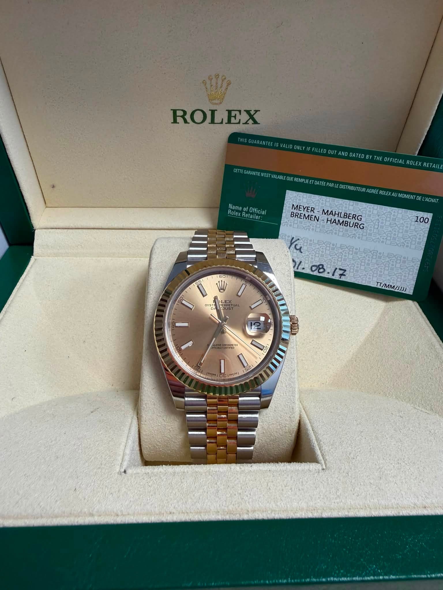 May be an image of wrist watch and text that says 'ROLEX BEYER-MAHLBERG BREMEN-HAMBURG MEYER MAHLBERG HAMBURG BREMEN- . TT/MM/31J3 ب 방한 I'