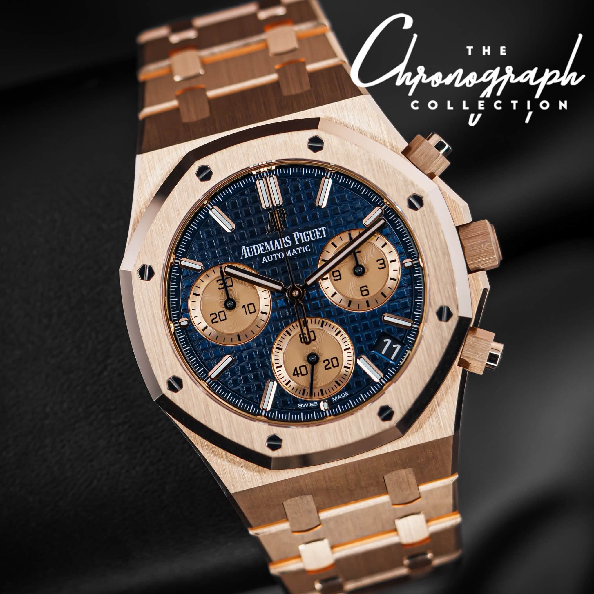 May be an image of wrist watch and text that says 'Anjanizjaph nponograph THE COLLECTION สุง1 maji 서통크 សុរៀ IUDEMAUS PIGUET AUTOMATIC ATIC υΤΟ R ง SIA ממיי MAΟ6 ร SWM 2尚 キ 4'