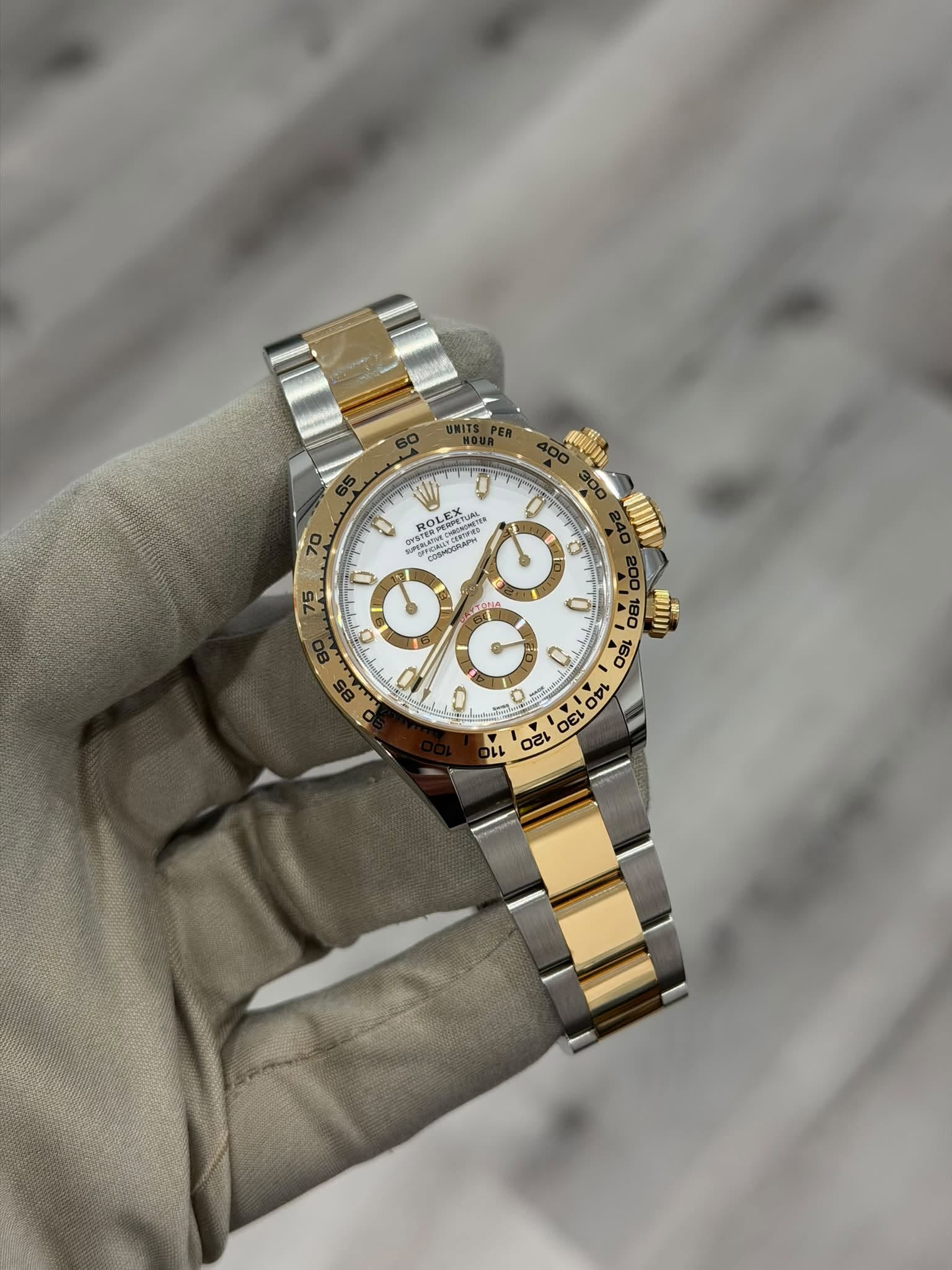 May be an image of wrist watch and text