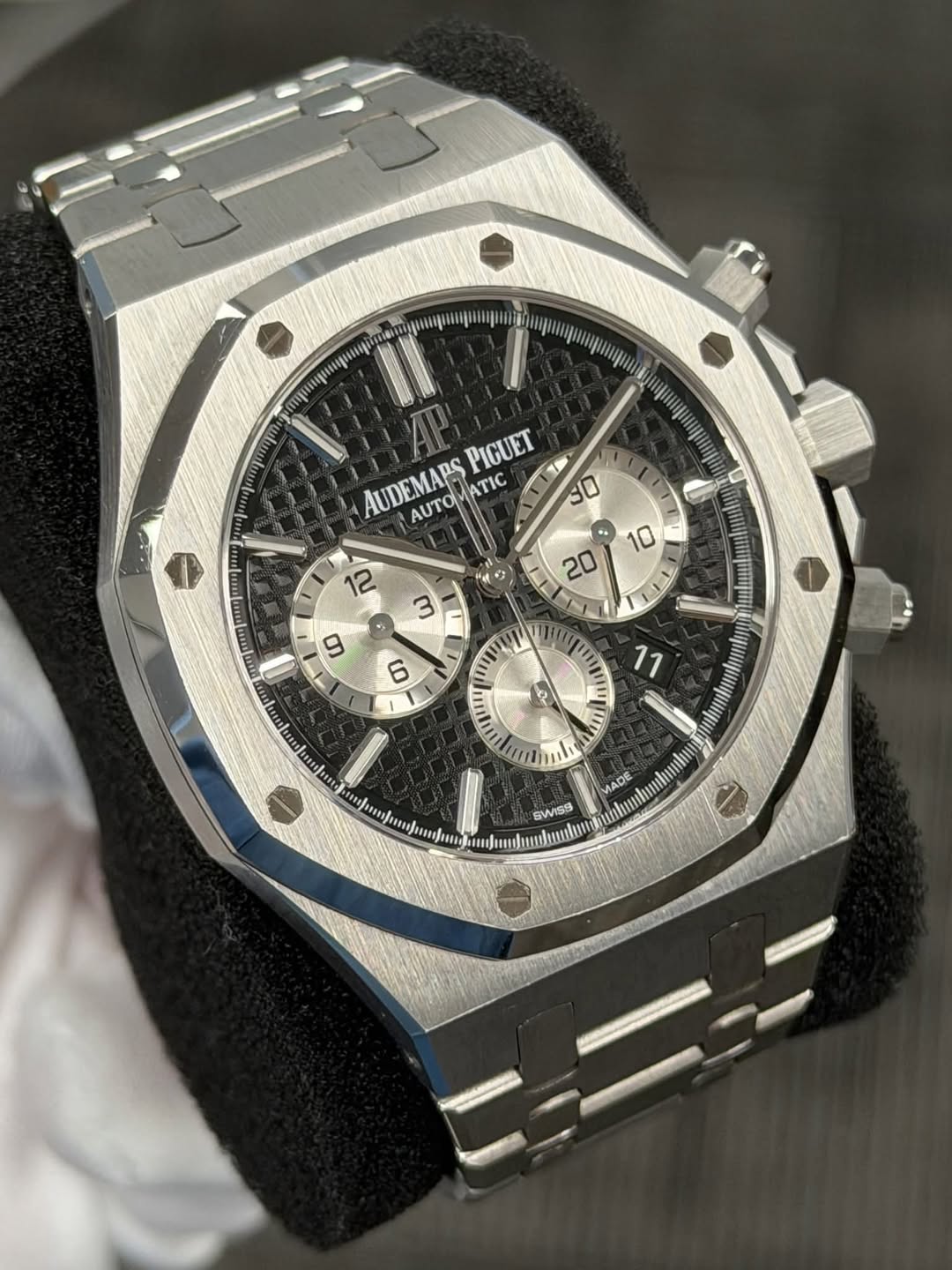 May be an image of wrist watch and text