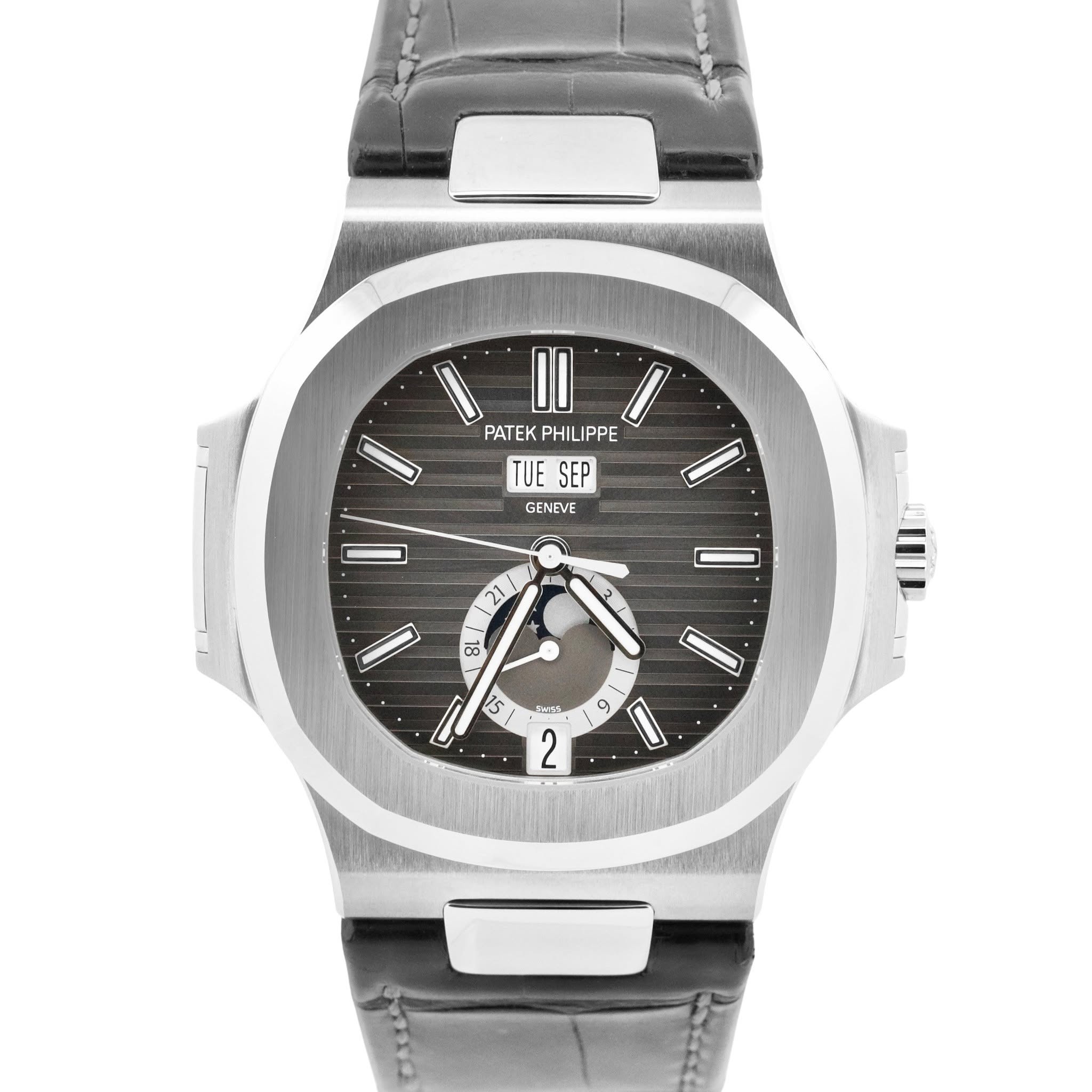 May be an image of wrist watch and text that says 'I0 PATEK PHILIPPE PATEKPHILIPPE PHIL TUE 3Cp SEP GENEVE D 21 86 ហី نا ١ 부소카원 2'