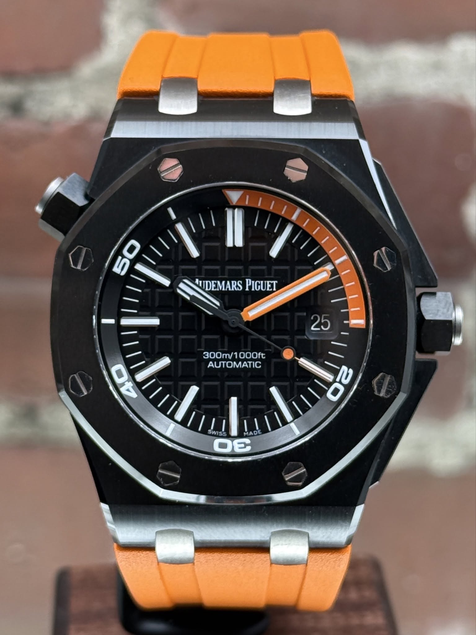 May be an image of digital watch and text that says 'AUDEMARS AUIDEMARSPIGUET PIGUET 25 300m/ 300m/1000ft 00Oft AUTOMATIC 44 ADE 30'