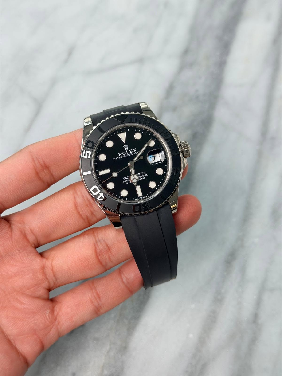 May be an image of wrist watch and text