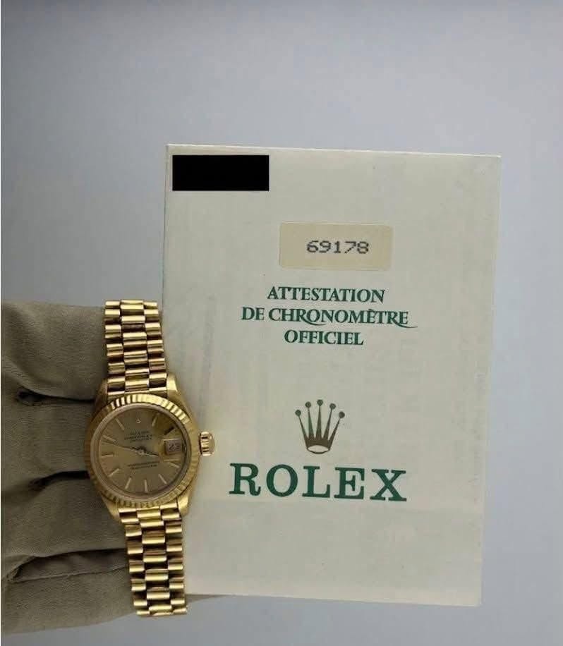 May be an image of wrist watch and text that says '69178 ATTESTATION DE DECHRONOMETRE OFFICIEL ROLEX'