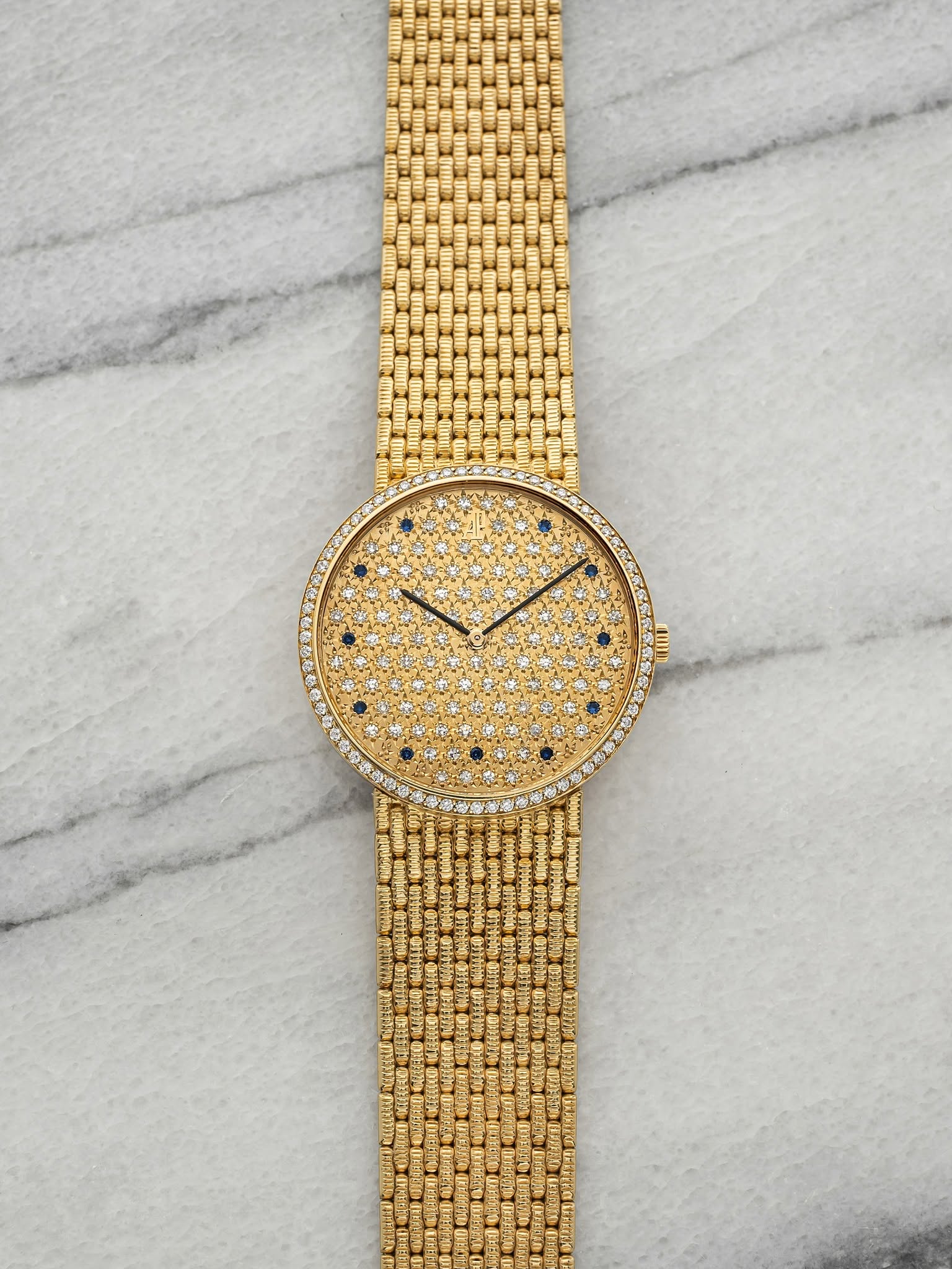 May be an image of jewelry and wrist watch