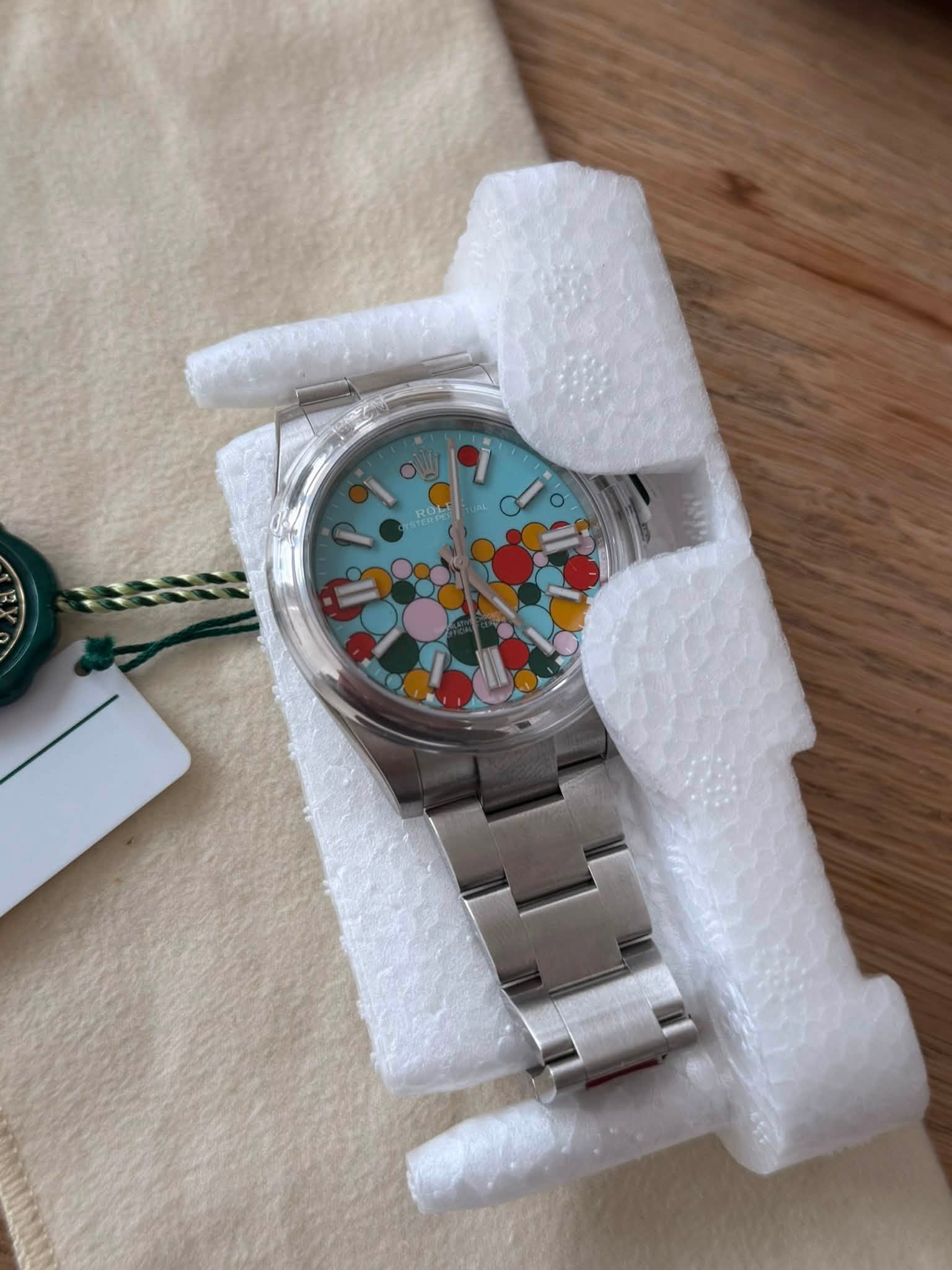 May be an image of wrist watch and text