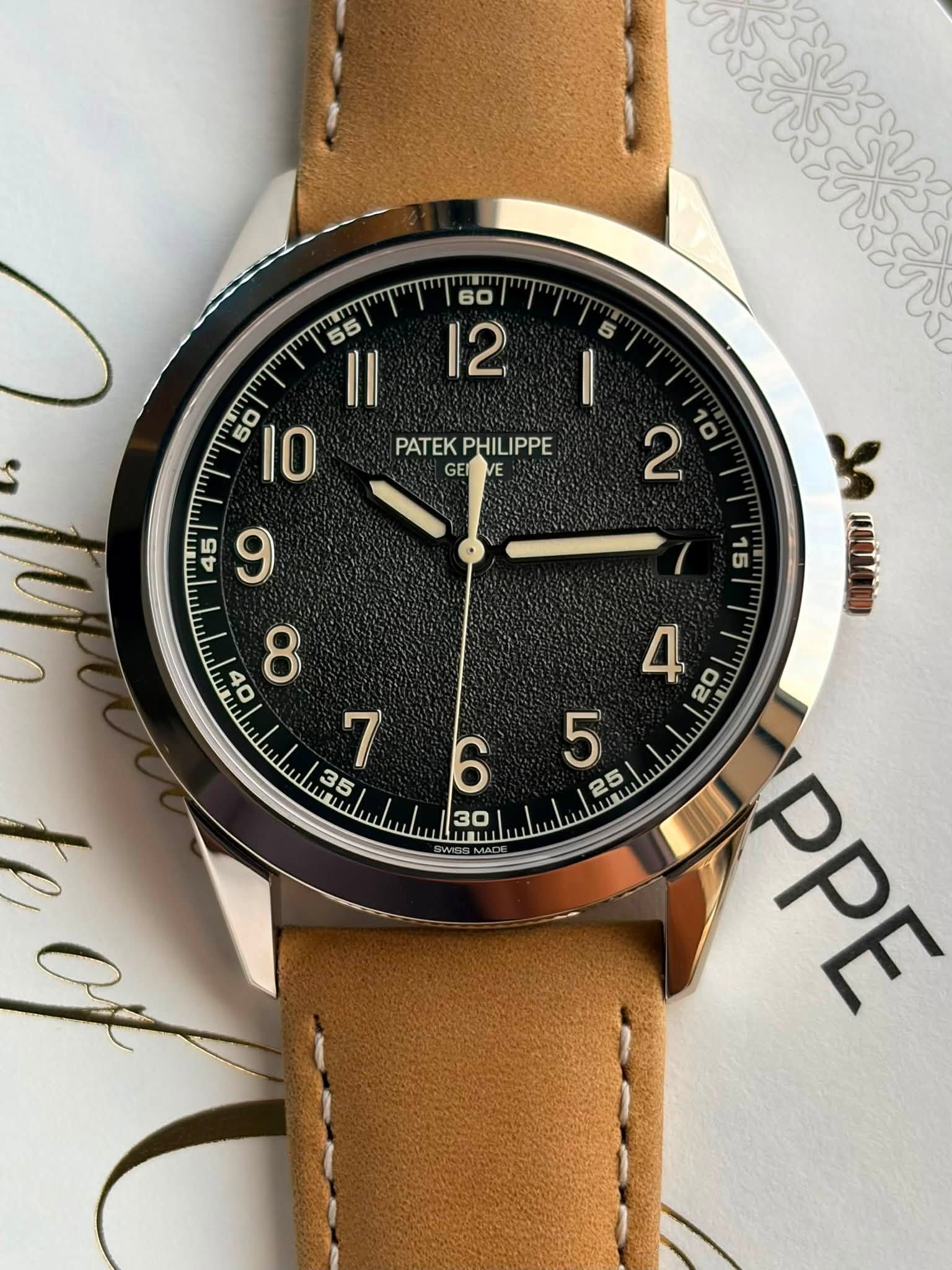 May be an image of wrist watch and text that says ' II 50 I0 PATEK PATEKPHILIPPE PHILIPPE GEI VE 2 10 15 مد แอ แน 5 9 8 7 n mu PPE'